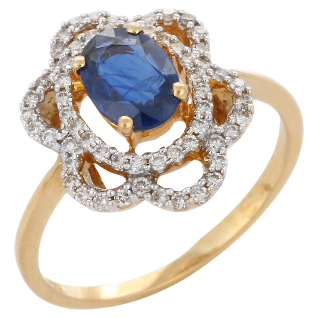En vente :  Bague de mariage fleur en or jaune 18 carats avec saphir bleu ovale 1,01 carat et diamants