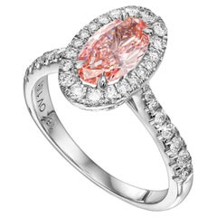1,01 Ct Oval Fancy Intense Pink (behandelte Farbe) in 18k Weiß Verlobungsring