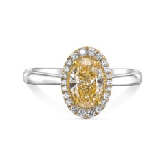 1.01 ct Oval Fancy Yellow Natural Diamond in 18k White Gold Ring