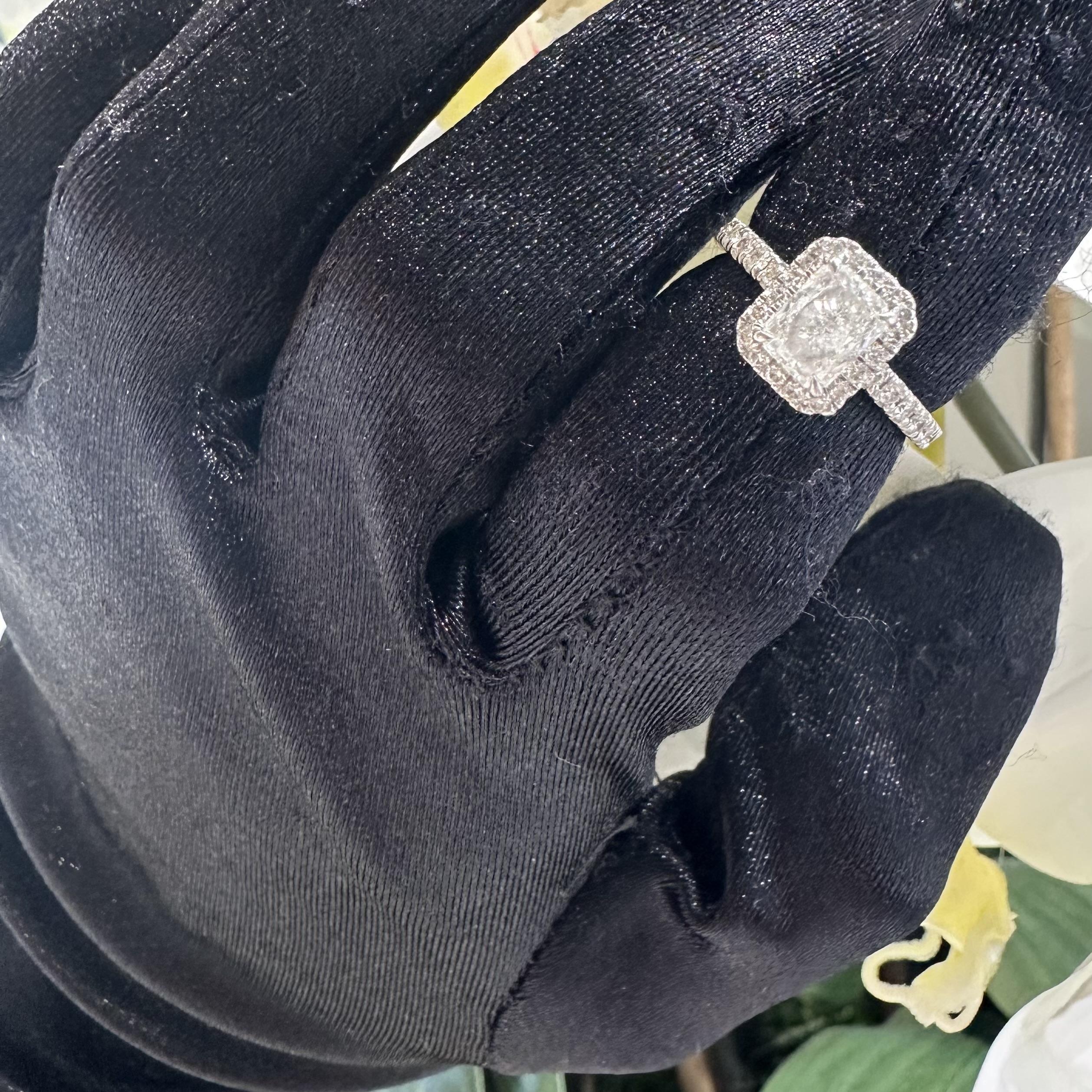 Ring Size: 5.5 (sizable upon request)
Material: White Gold
Metal Purity: 14k
Stones: 1.01 Cut Cornered Rectangular Modified Brilliant Center Stone Diamond
Center Stone Color / Clarity: H/ SI1
Center Stone Ratio: 1.30
Side Stone Diamond Approximate