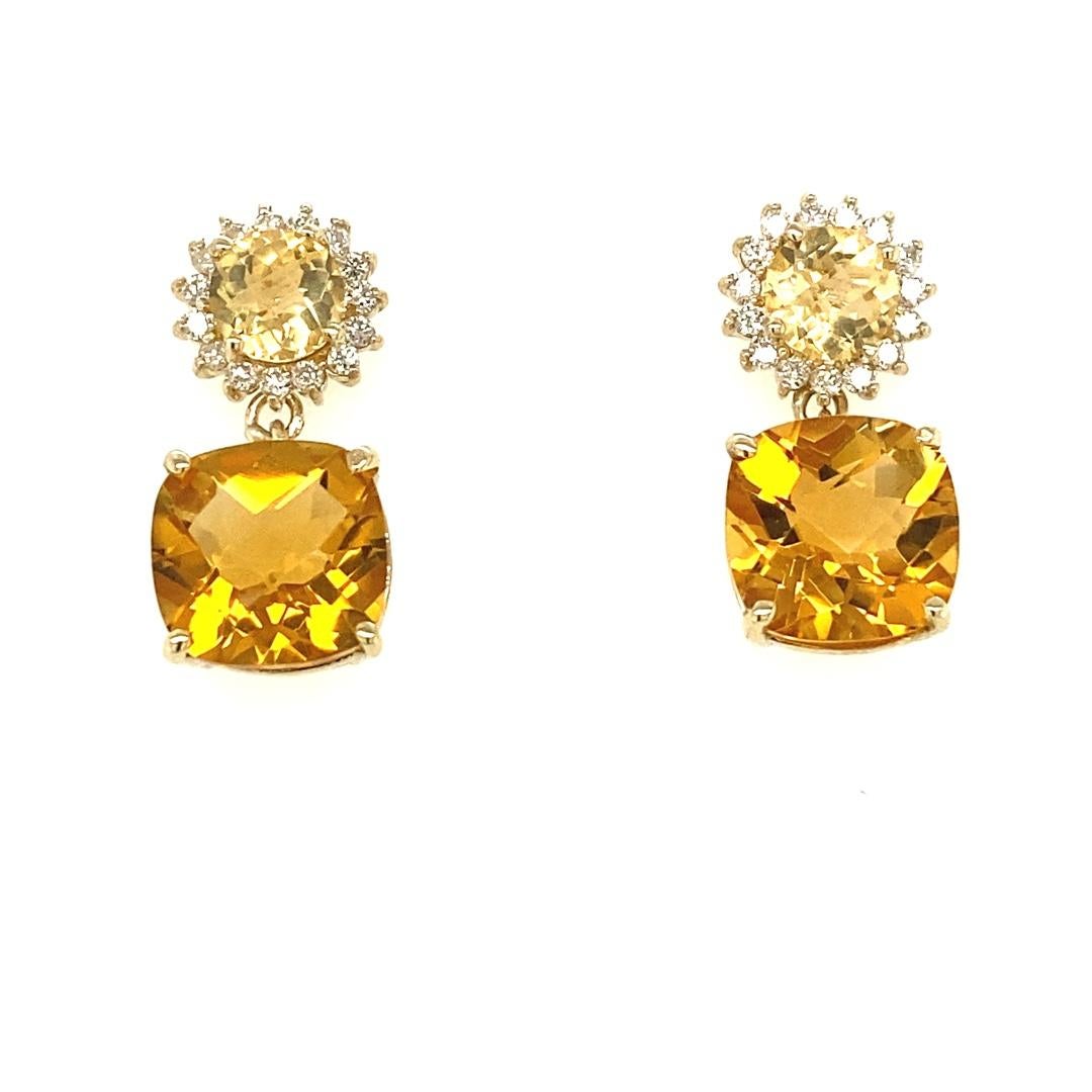 10.10 Carat Citrine Quartz Diamond Yellow Gold Drop Earrings 

These lovely earrings have 2 vibrant Cushion Cut Citrine Quartz that weigh 8.05 carats.  There are also 2 Round Checkered Cut Citrines on the top of the earrings that weigh 1.62 carats. 