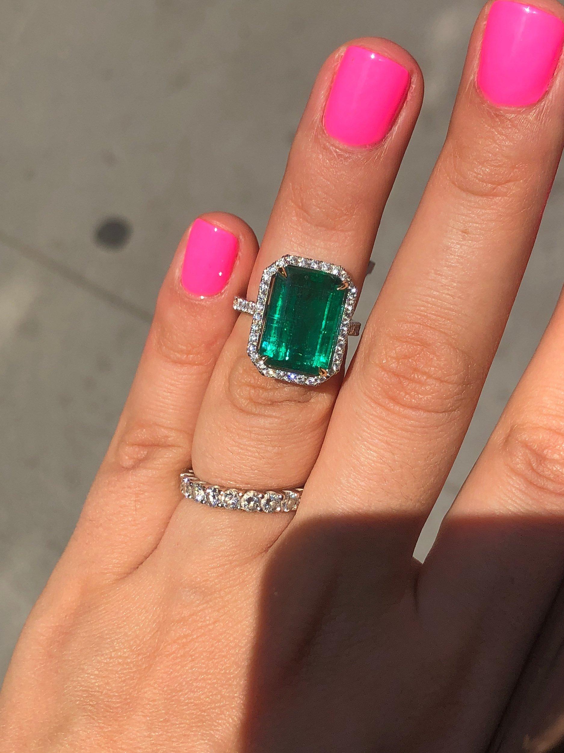 green emerald cut ring