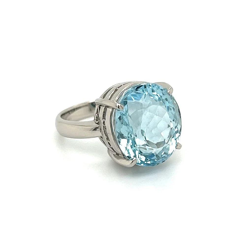 Simply Beautiful! Aquamarine Solitaire Platinum Cocktail Ring. Centering a securely nestled Hand set 10.10 Oval Aquamarine. Hand crafted Platinum mounting. Dimensions: 1.08” l x 0.79” w x 0.56” h. The ring epitomizes vintage chic and would make a