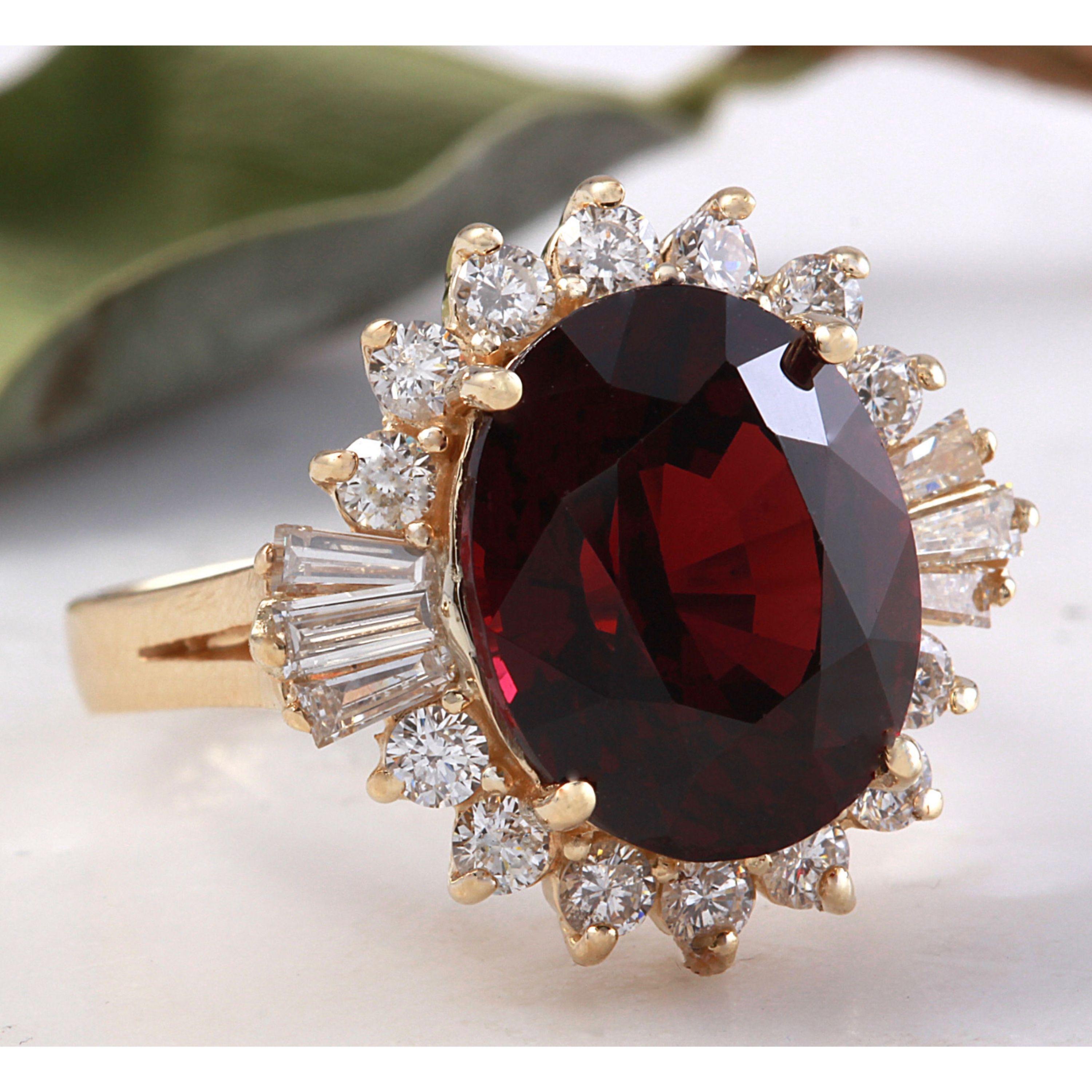 10.10 Carats Impressive Red Garnet and Natural Diamond 14K Yellow Gold Ring

Total Natural Oval Red Garnet Weight is: Approx. 9.00 Carats

Garnet Measures: Approx. 14.00 x 12.00mm

Natural Round & Baguette Diamonds Weight: Approx. 1.10 Carats (color