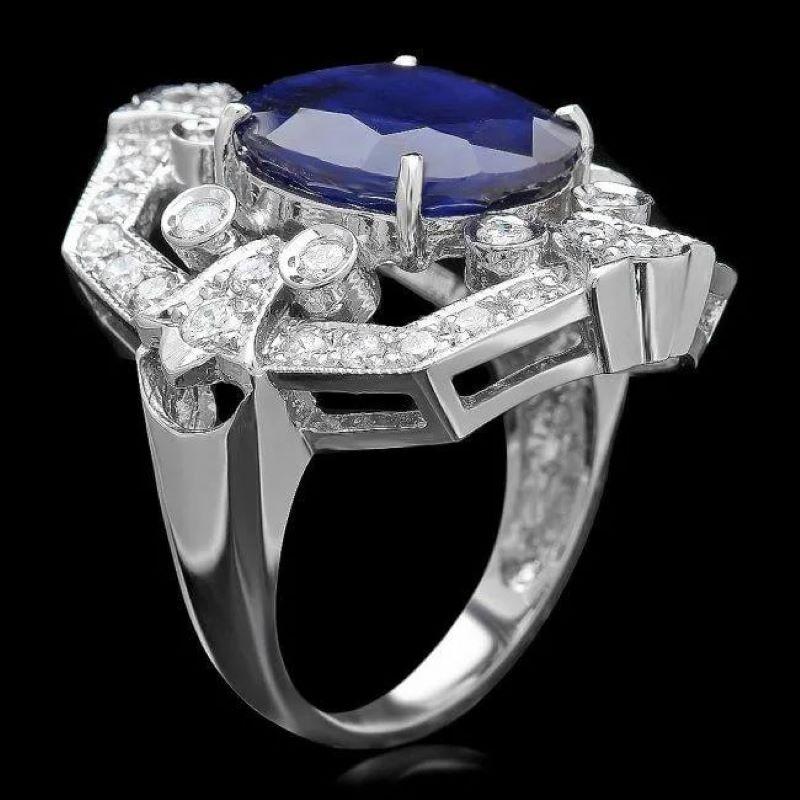 10.10 Carats Natural Blue Sapphire and Diamond 14K Solid White Gold Ring

Total Blue Sapphire Weight is: Approx. 8.90 Carats

Natural Sapphire Measures: Approx. 14.00 x 12.00mm

Sapphire treatment: Diffusion

Natural Round Diamonds Weight: Approx.