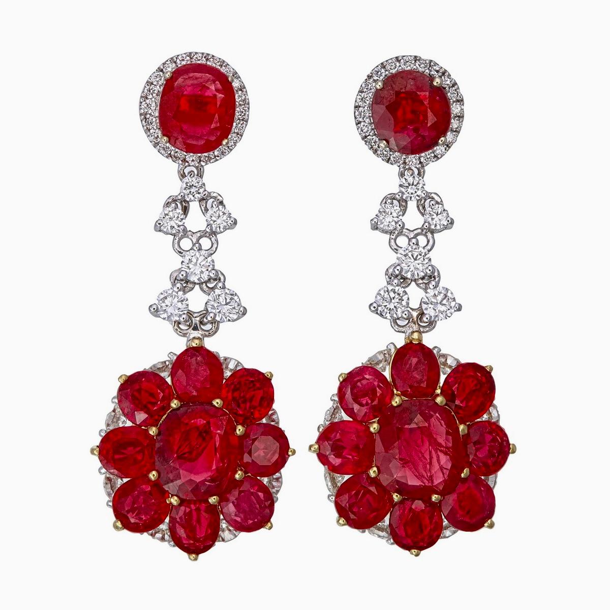 Radiant and exquisite ruby and diamond earrings hand curated by Rewa jewels in 18 karat white gold.

The exclusive rubies are originally from Burma. They are untreated and no heat. There are 2 rubies of 2.34 carat weight total and 2 more rubies of
