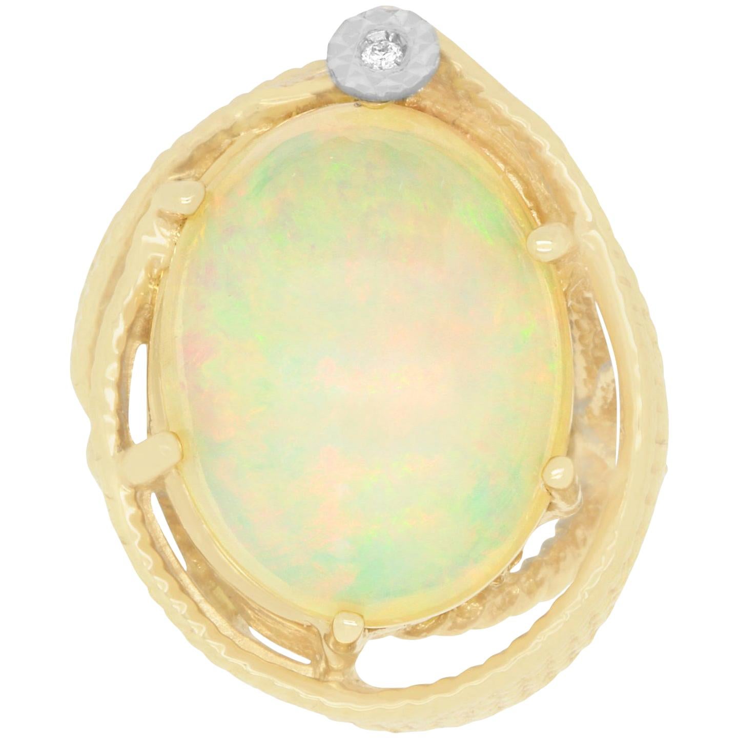 Oval Shaped Opal Yellow Swirls Single Round White Diamond 14K Yellow Gold Ring