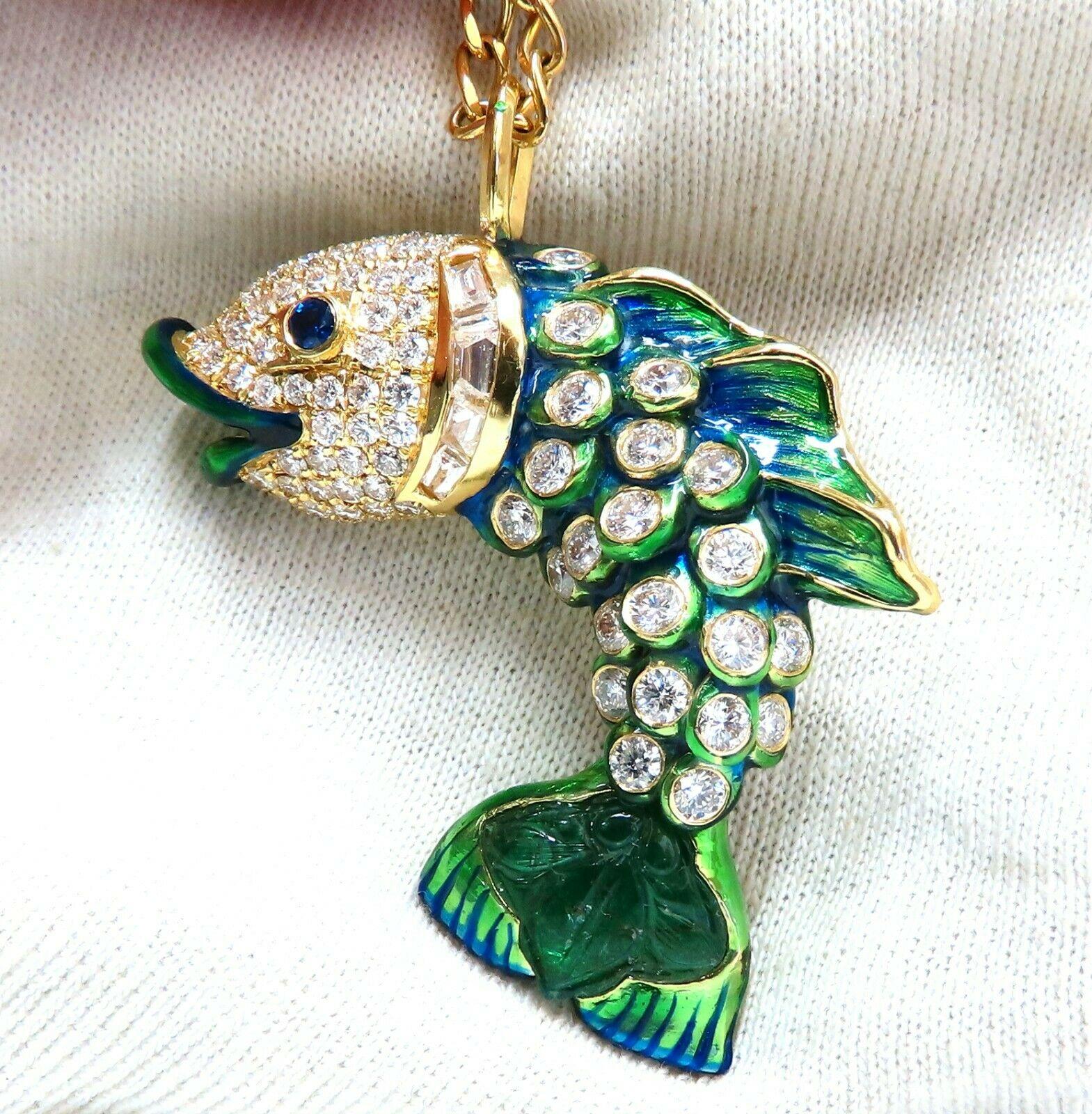 Lucky Catch.

5.36ct. Natural Diamonds fish pendant.
Custom Handmade made 
Rounds and Baguettes.
G-color, Vs-2 clarity

.26ct Natural Round Sapphire (Eye)
4.50ct Natural Carved Green Emerald (Tail)
3D domed effect
Excellent enamel
