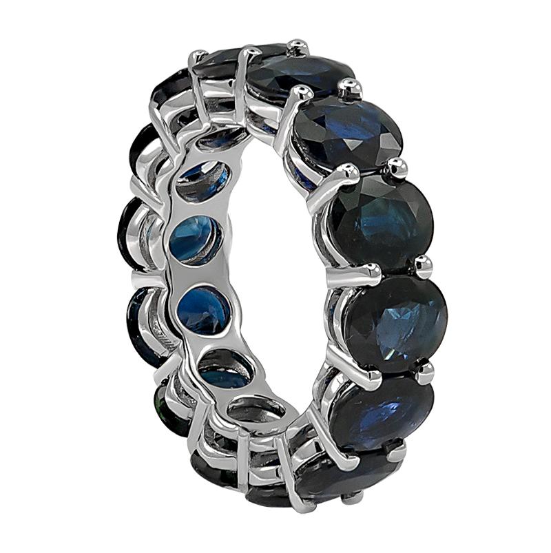 A gorgeous eternity band composed of  fourteen oval sapphire set with shared prongs made of 14K white gold mounting. A combination of bold and elegance! With a total sapphire weight of approximately 10.15 carats. 

Ring Size: 5.5 

0.20” width,