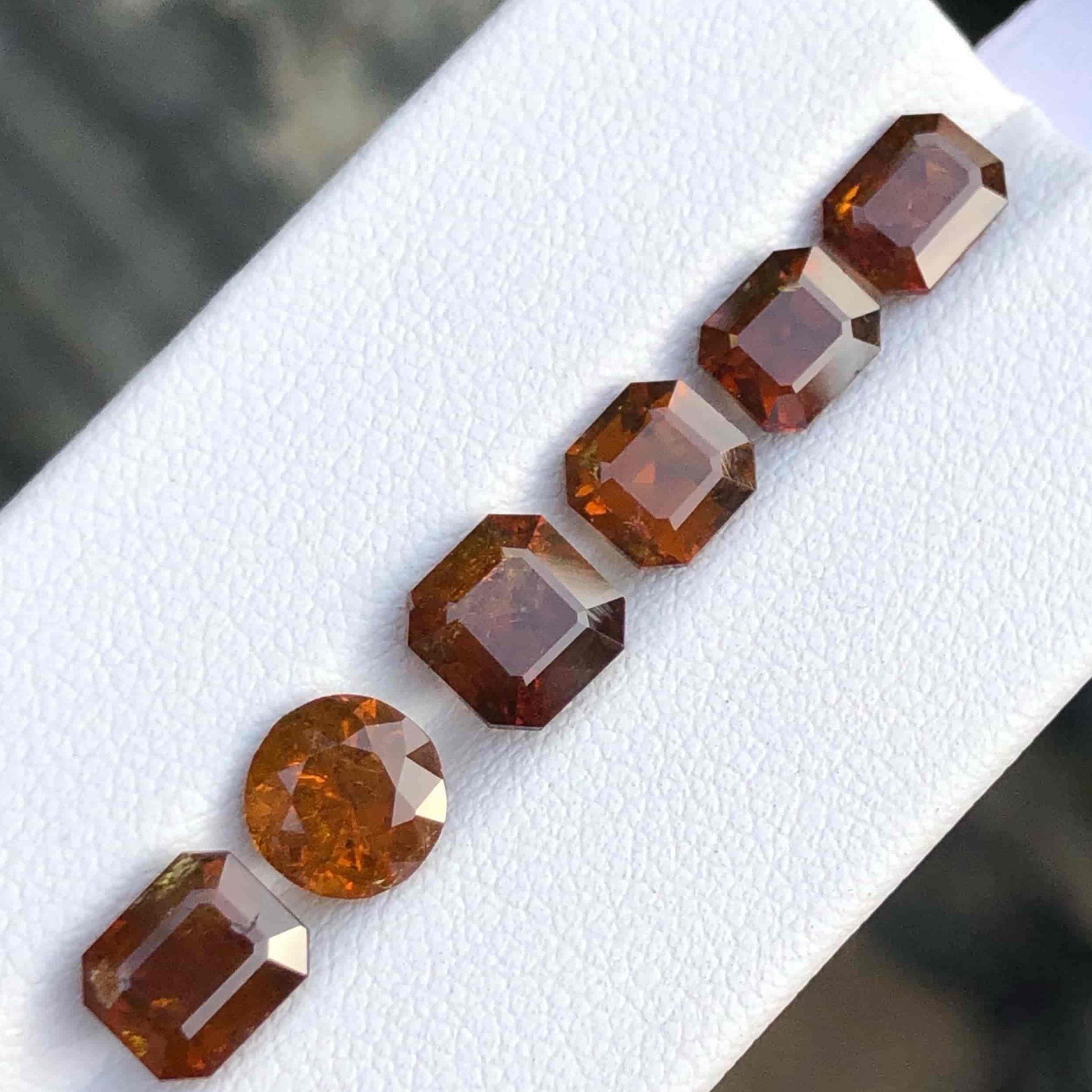 Gemstone Type Natural Mali Garnet Lot
Weight 10.15 carats
Weight Range	1.40 to 2.35 carats
Clarity Included
Shape Fancy Cut
Origin Mali
Treatment None





Introducing the captivating 10.15 carats Natural Brown Garnet Stones Lot, a collection of