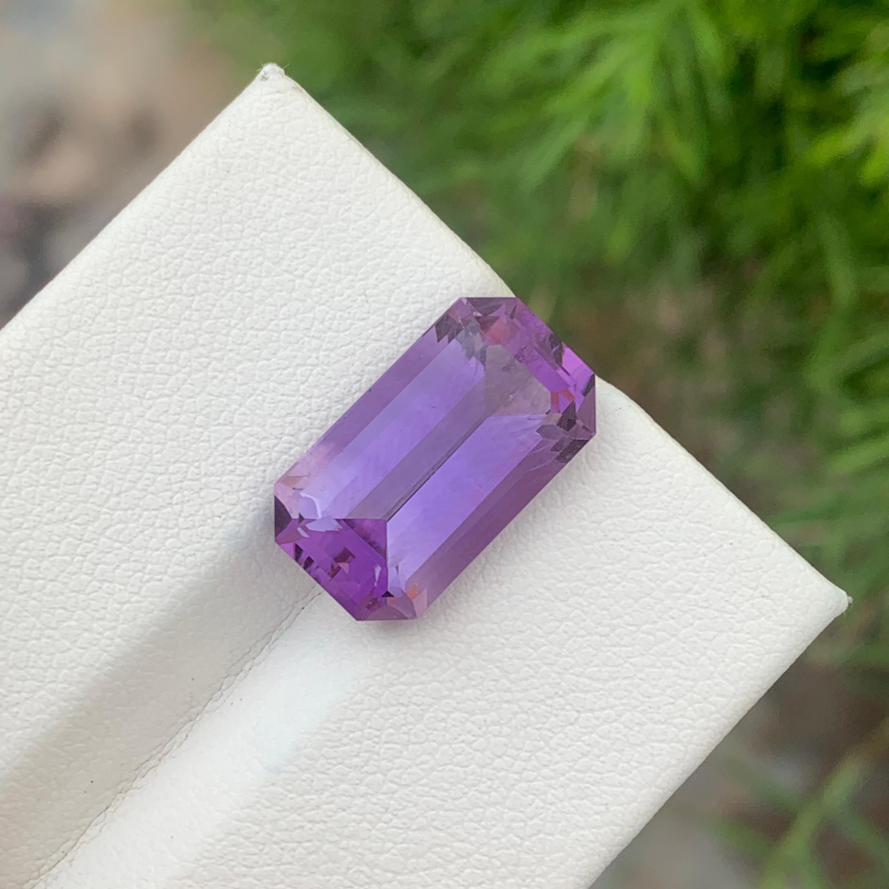Loose Amethyst 
Weight: 10.15 Carats 
Dimension: 17.6x9.9x7.8 Mm
Origin: Brazil
Color: Purple
Shape: Emerald 
Treatment: Non
Certificate: On Customer Demand 
Amethyst is a captivating gemstone known for its stunning purple hue and its deep-rooted