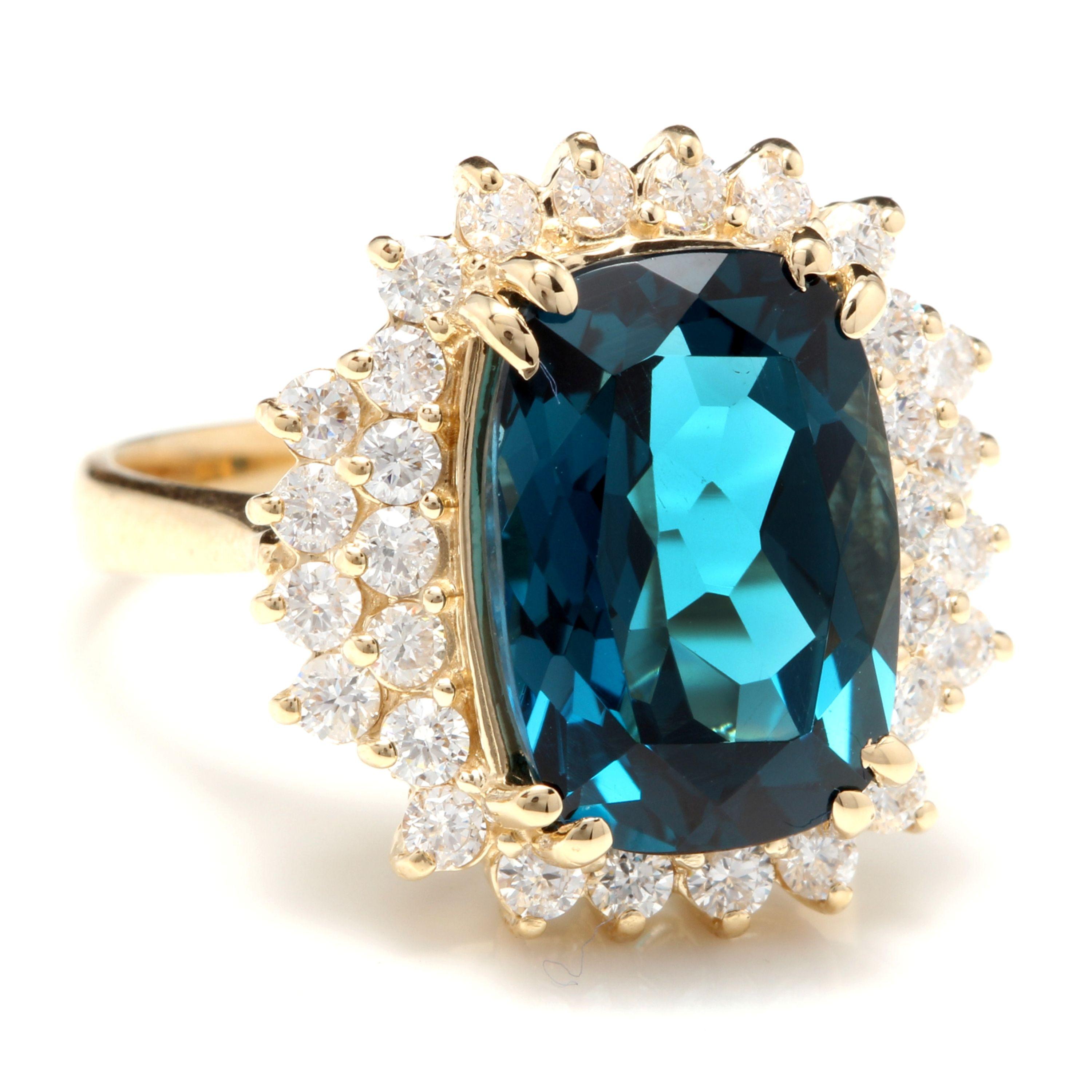 10.15 Carats Natural Impressive LONDON BLUE TOPAZ and Diamond 14K Yellow Gold Ring

Total Natural London Blue Topaz Weight: Approx. 9.00 Carats

London Blue Topaz Measures: Approx. 14 x 10mm

Natural Round Diamonds Weight: Approx. 1.15 Carats (color