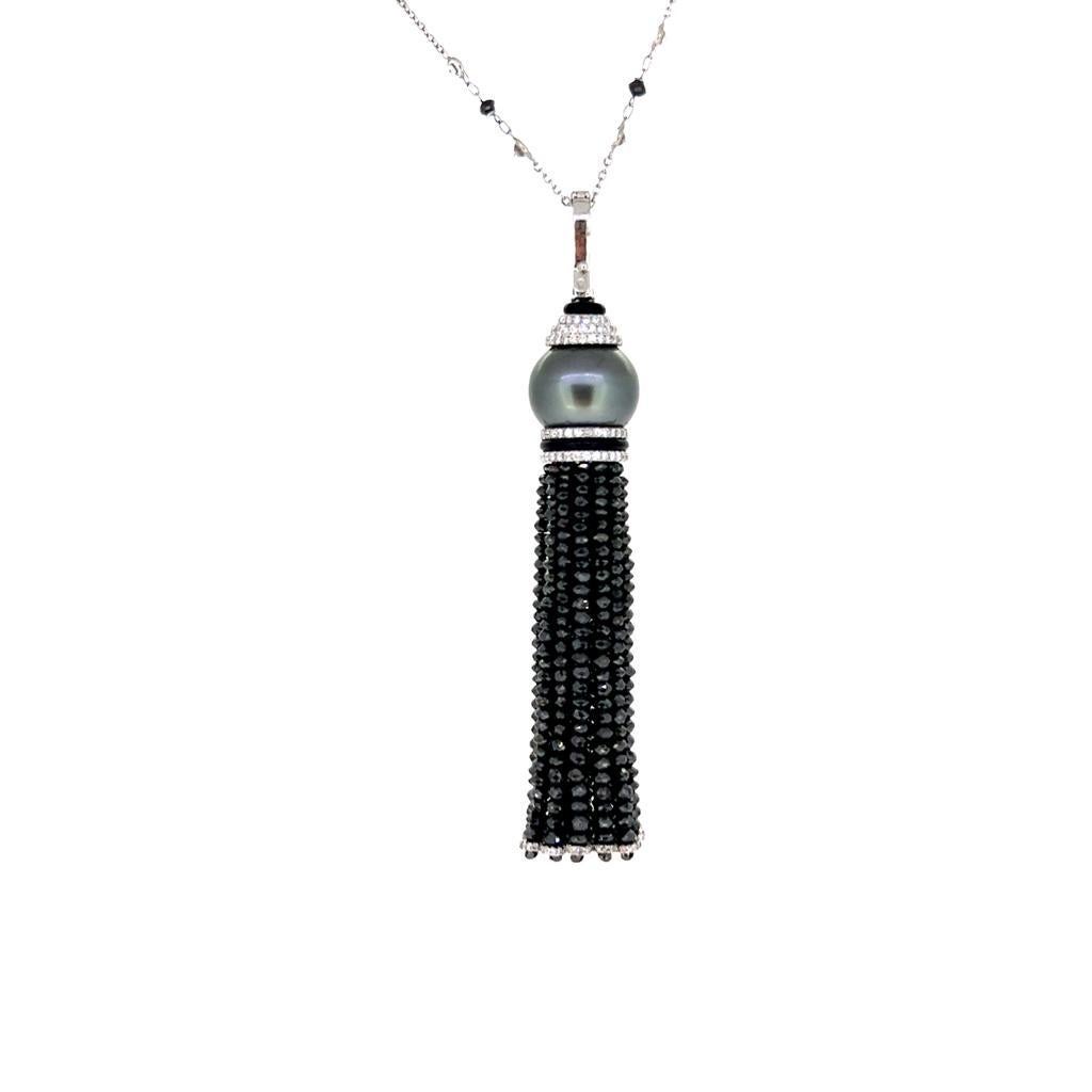 This is a 1920 vintage inspired Black and Colorless Diamond Cultured Pearl Onyx Tassel Necklace weighing 101.58 carats in total.  It is not only chic and stylish but also extremely eye catching which features radiant Diamond beads that is completely