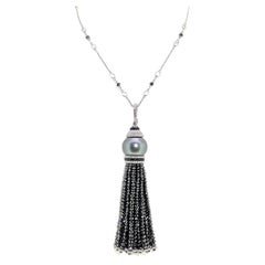 101.58 Carats Diamond and Pearl Tassel Necklace set on 18 Karat White Gold