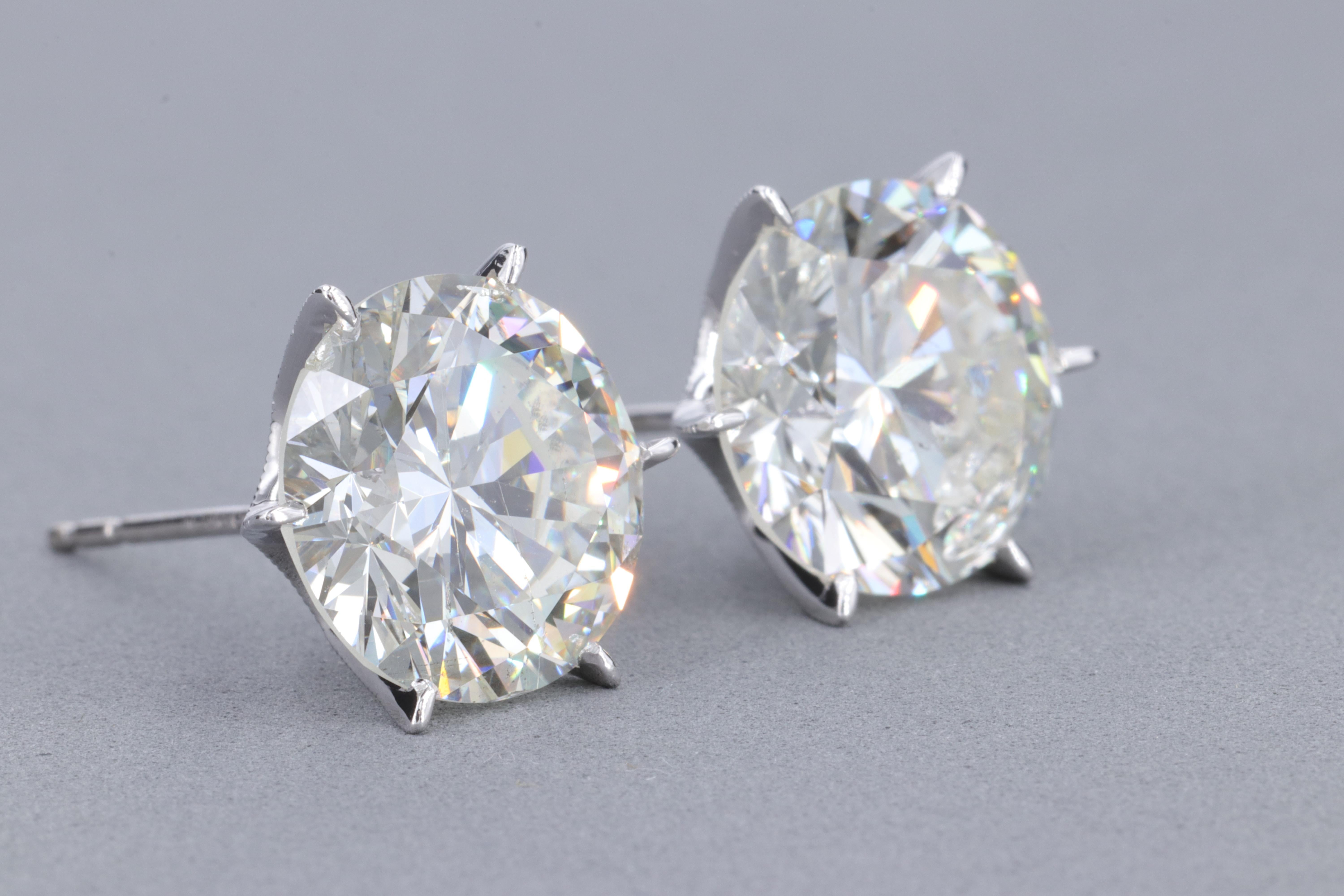 10.16 Carat Natural Diamond Stud Earrings in 18 Karat White Gold

This large set of diamond stud earrings features a

5.07 Carat K Color I1 Clarity GIA Round Brilliant Cut Natural Diamond

and a

5.09 Carat J Color I1 Clarity Round Brilliant Cut