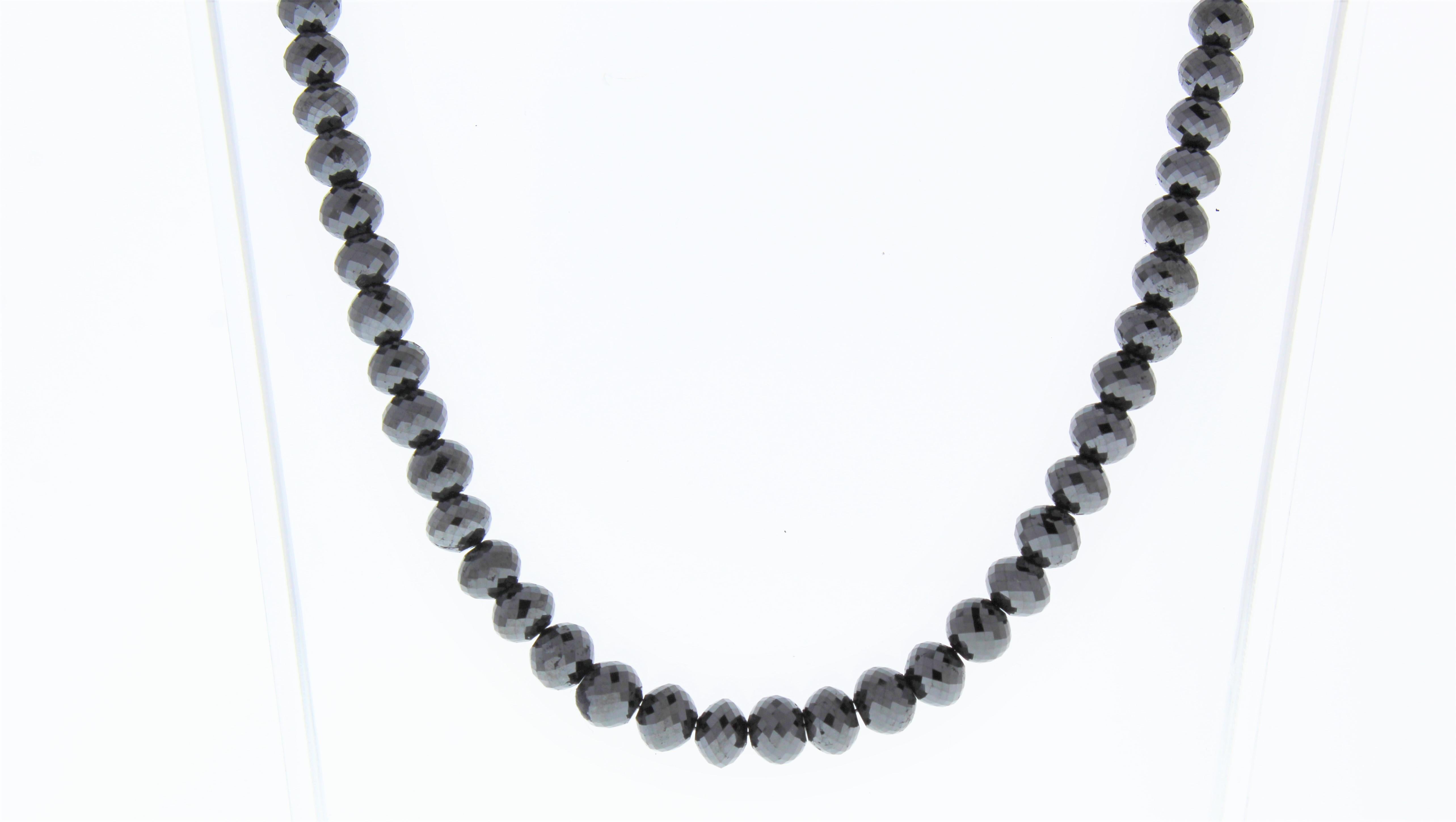 This necklace is a dramatic strand of 107 faceted briolette black diamonds totaling 101.66 carats. Slim in design and perfect for layering alongside other necklaces and chains, this black diamond necklace is sure to get noticed.