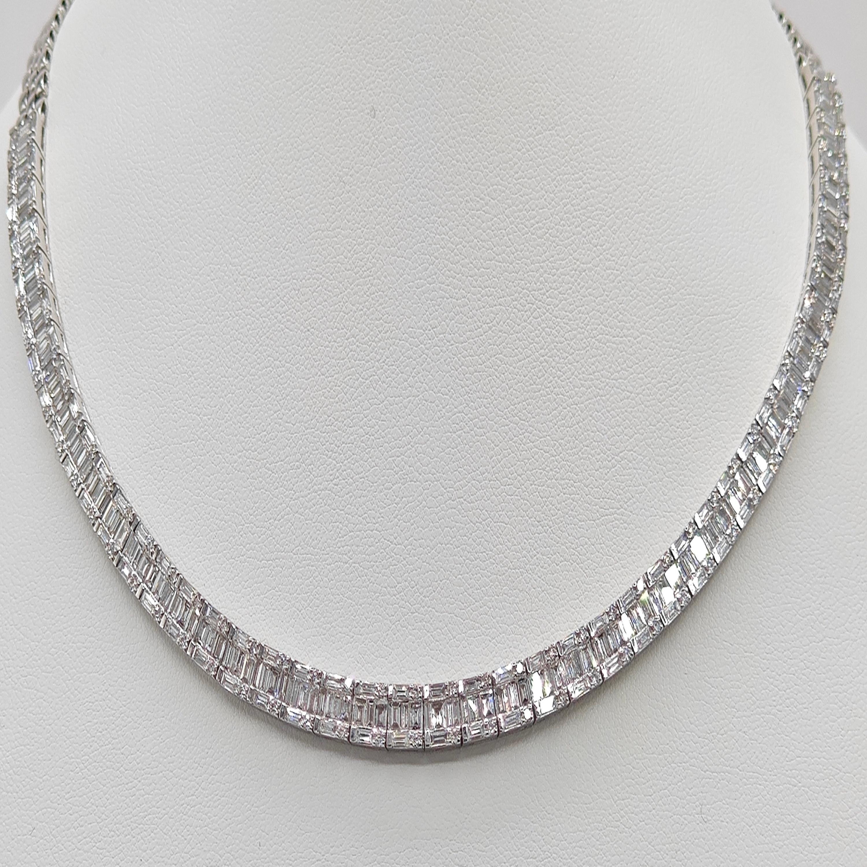 110 White Round Diamonds: 1.24 Carats
325 Baguette Diamonds: 8.93 Carats
Metal: 18K White Gold, 39.78 Grams
