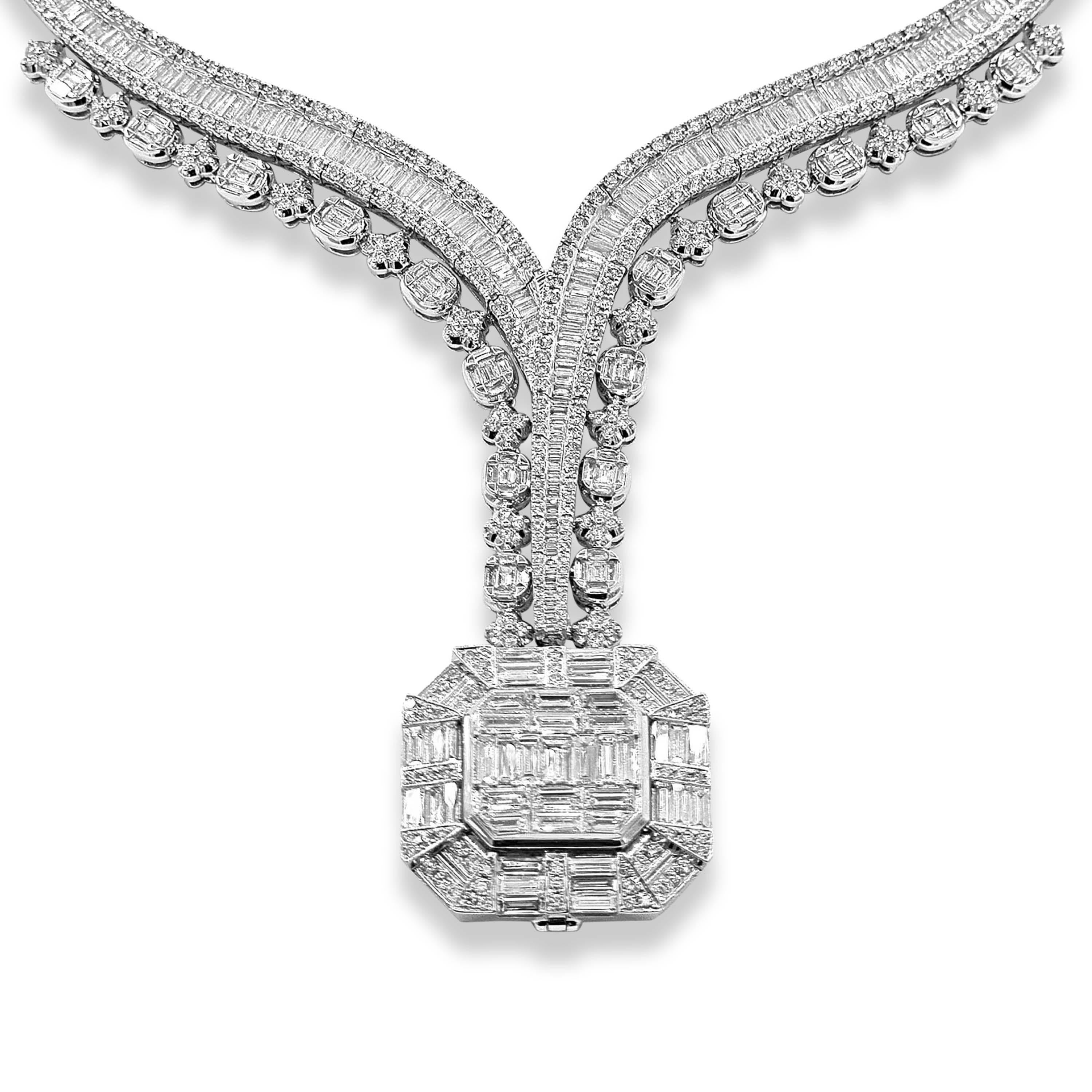 650 White Round Diamonds: 12.36 Carats 
319 Baguette Diamonds: 14.62 Carats 
Metal: 18K White Gold, 89.81 Grams