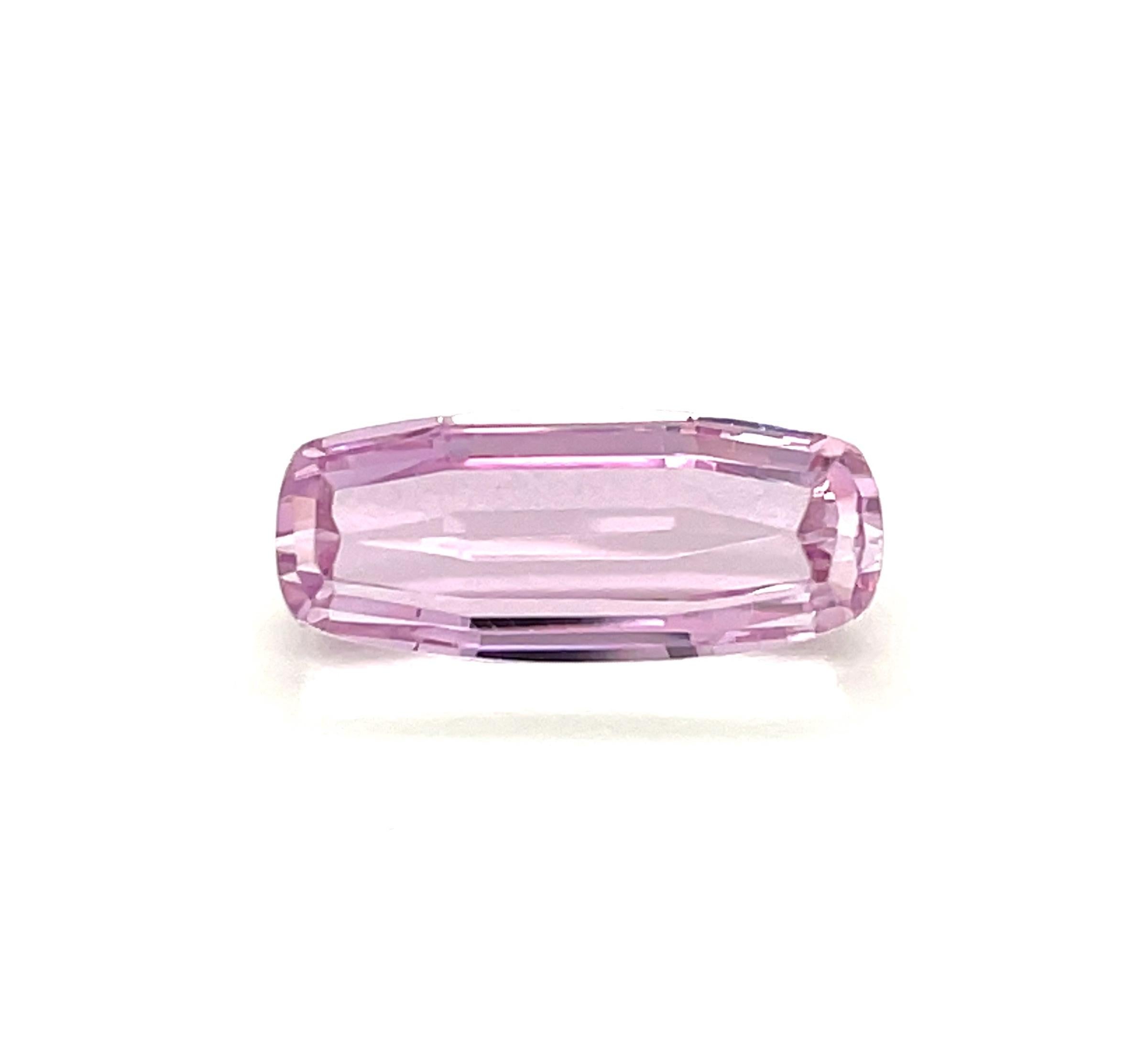This pretty cherry blossom pink kunzite weighs 10.17 carats and would make a beautiful ring or pendant! It is a faceted designer cut, which shows off its beautiful crystalline nature and clarity. This gemstone measures 18.48 x 7.73 x 7.07mm and