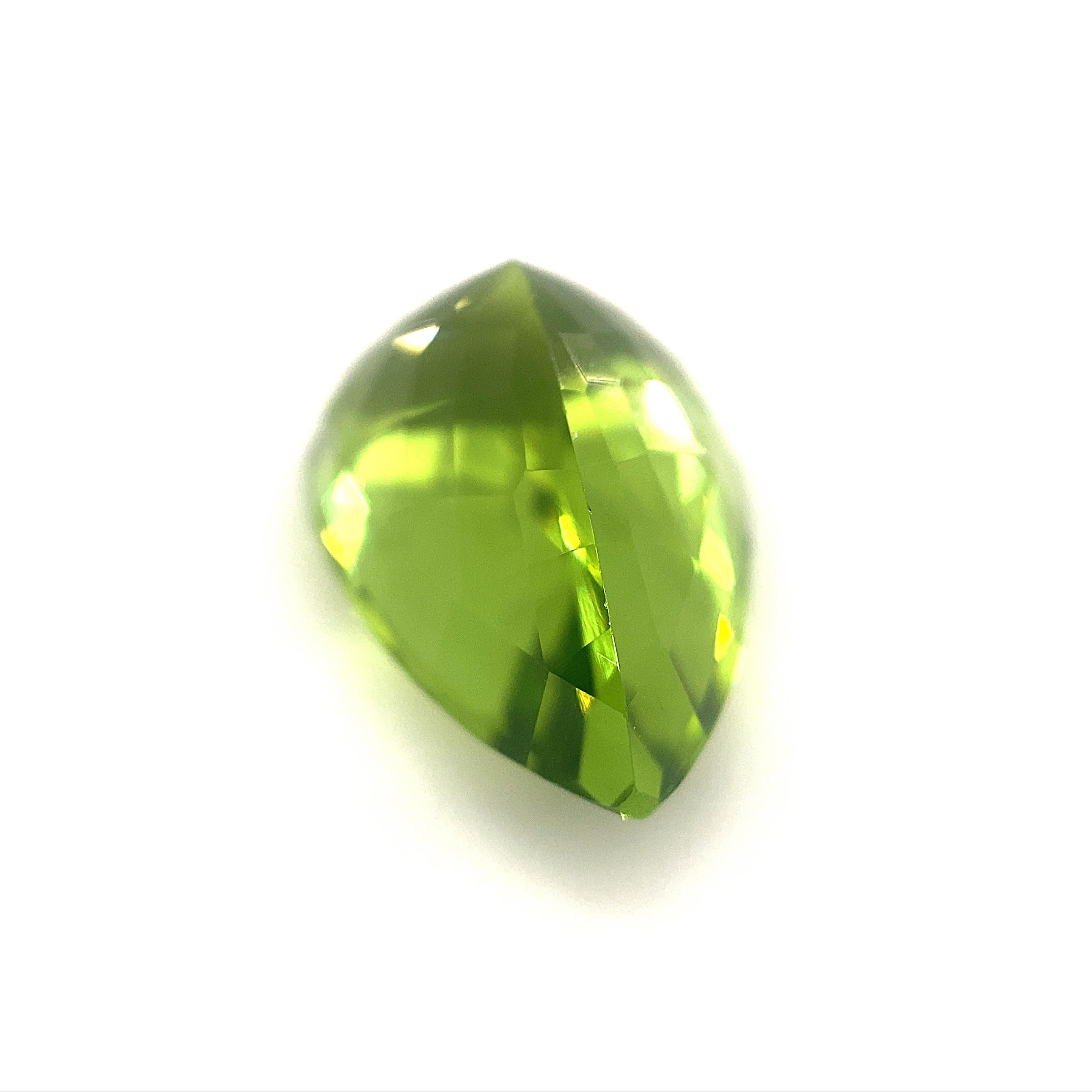 This is a stunning GIA Certified Peridot 

The GIA report reads as follows:

GIA Report Number: 2211647425
Shape: Pear
Cutting Style: 
Cutting Style: Crown: Brilliant Cut
Cutting Style: Pavilion: Modified Brilliant Cut
Transparency: