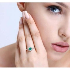 1.01ct Emerald And Diamond Cluster Ring