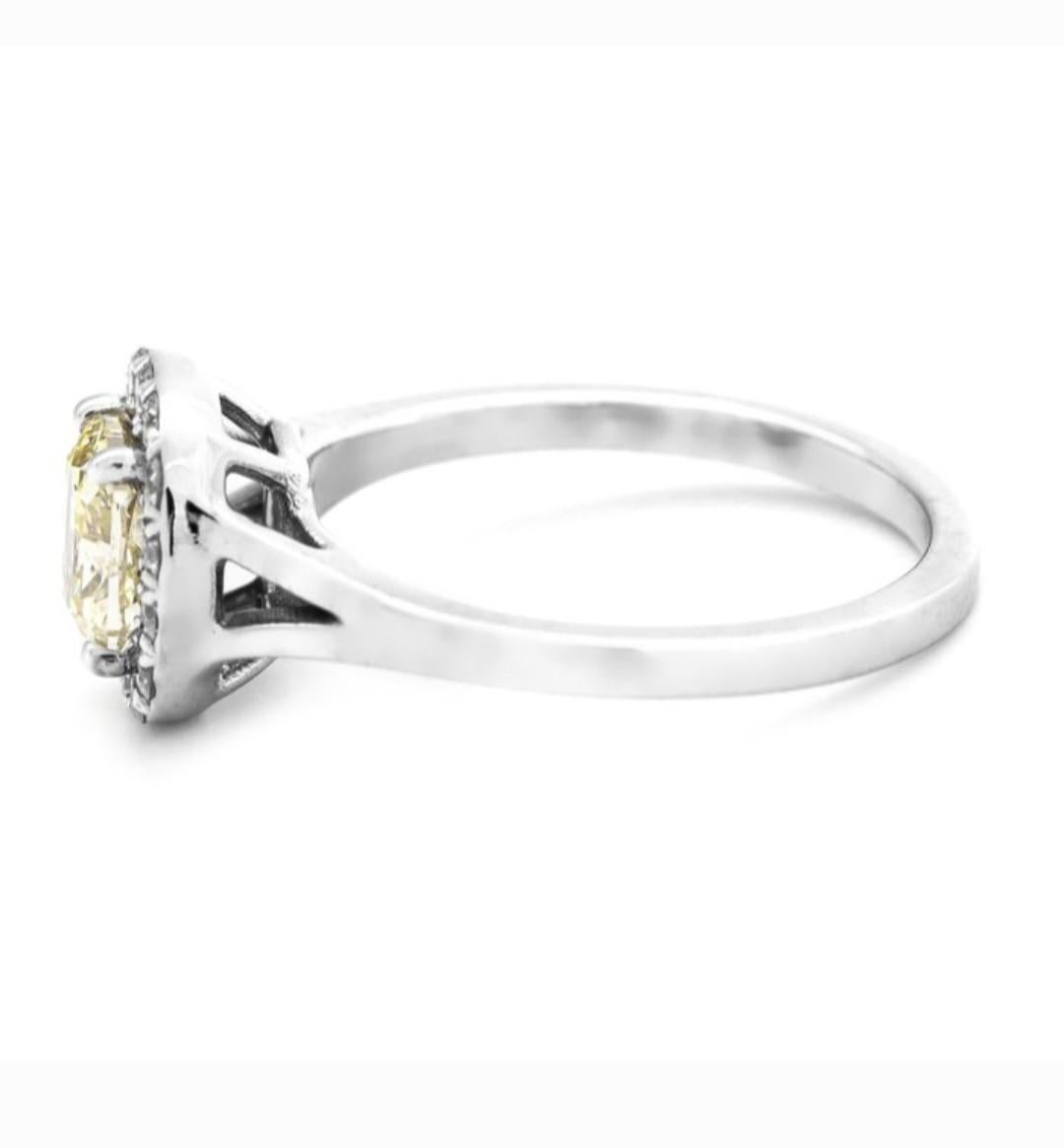 Contemporary 1.01ct Fancy Yellow Diamond White Gold Cluster Ring For Sale
