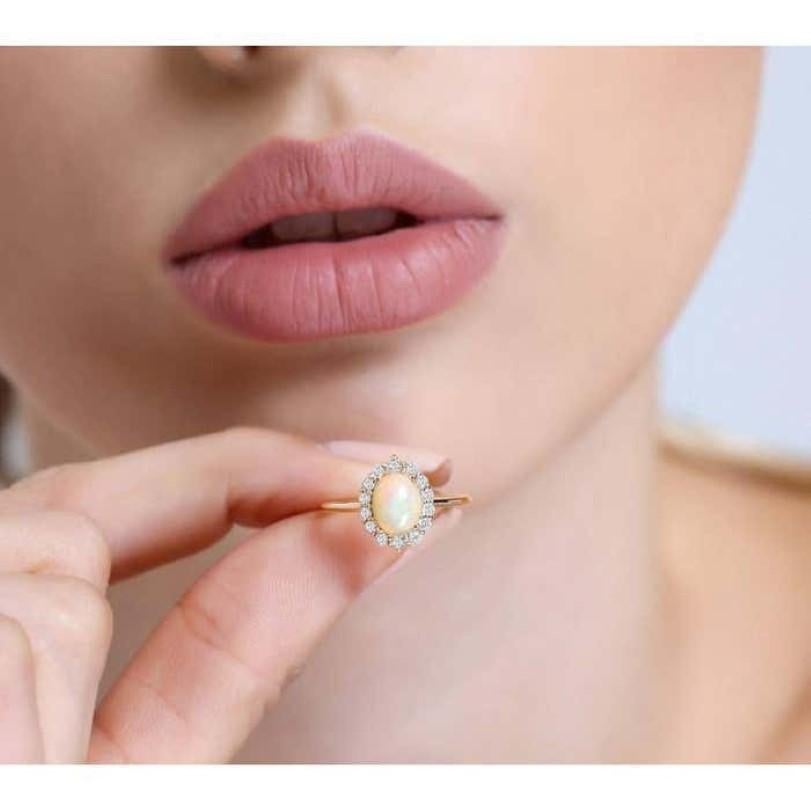 Modern 1.01ct Opal And Diamond Halo Ring For Sale