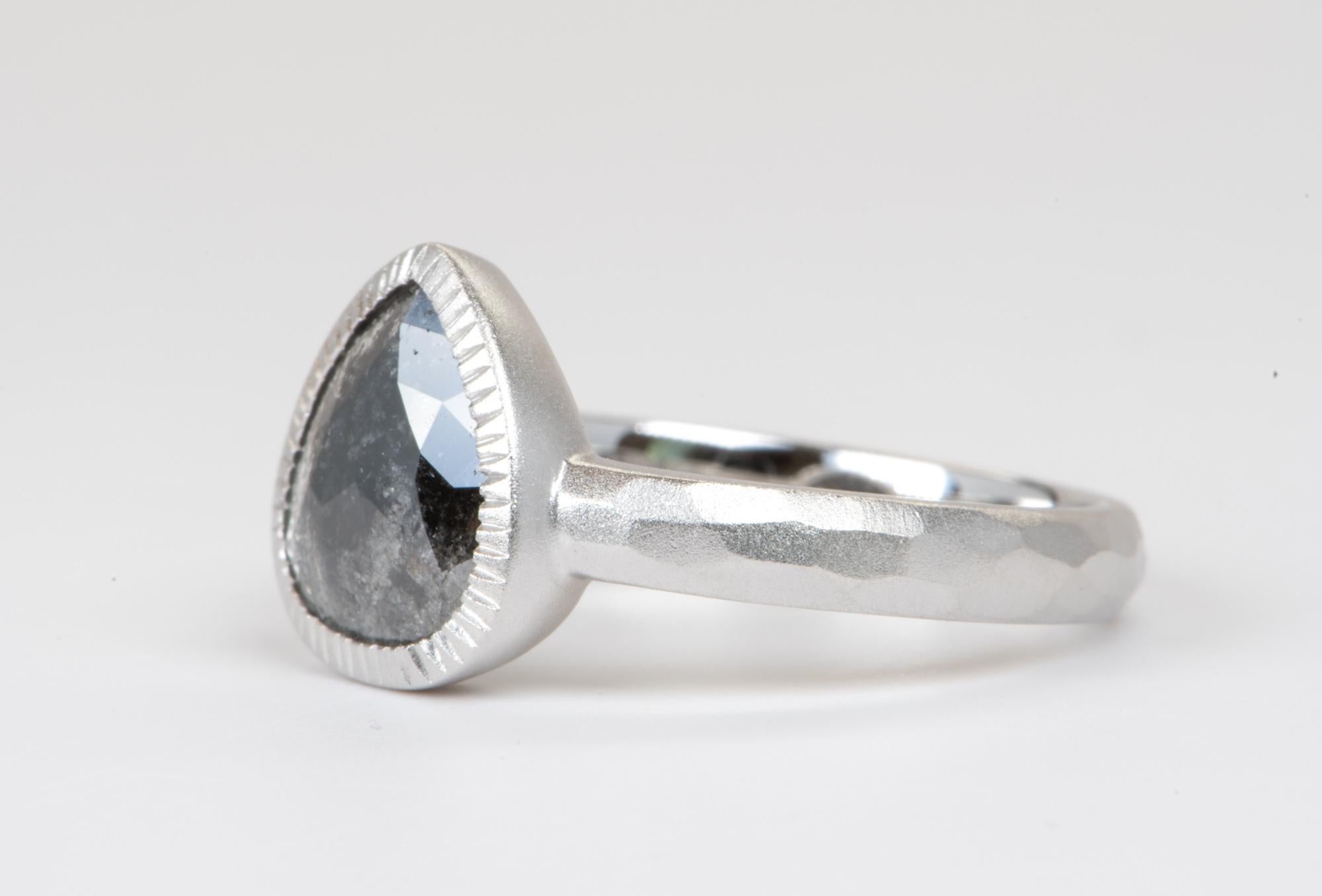 bezel set pear shaped diamond ring