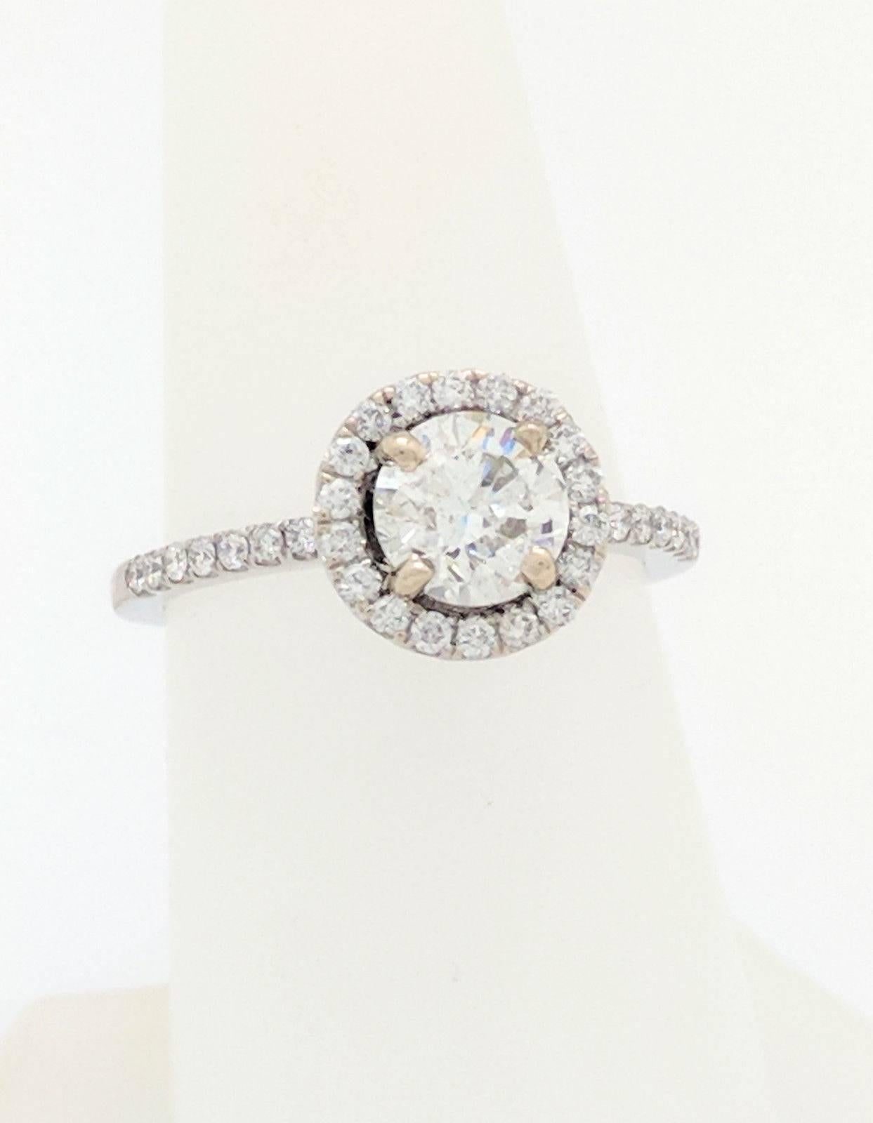 1.01ct. Round Brilliant Natural Diamond Halo Engagement Ring EGL Certified SI2/I

You are viewing a stunning 1.01ct. natural round brilliant cut diamond. This diamond is certified by EGL (EGL USA Gemological Institute) and has been graded as SI2 in
