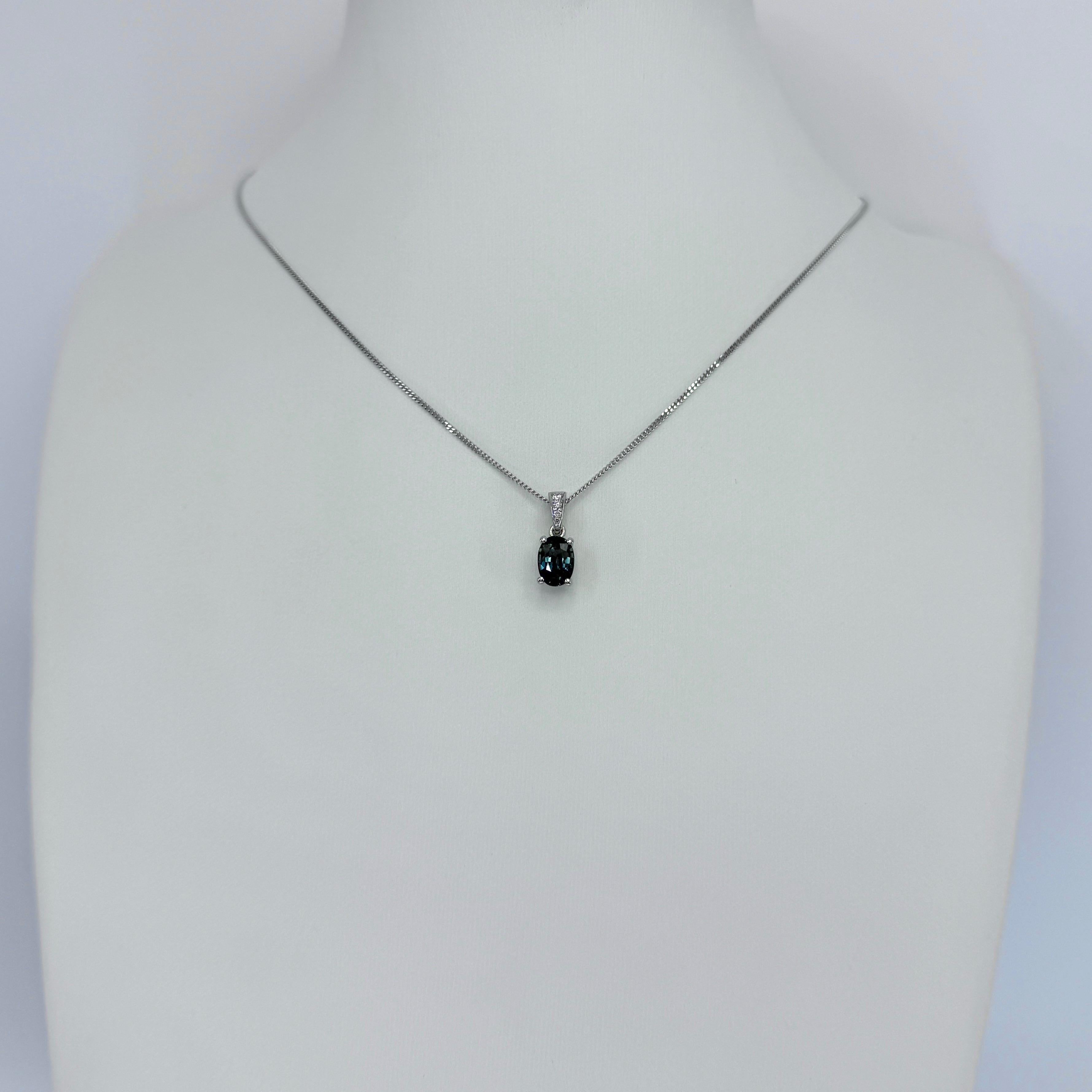 Colgante solitario en platino de zafiro azul verde vivo y diamante talla oval de 1,01 ct en venta 1
