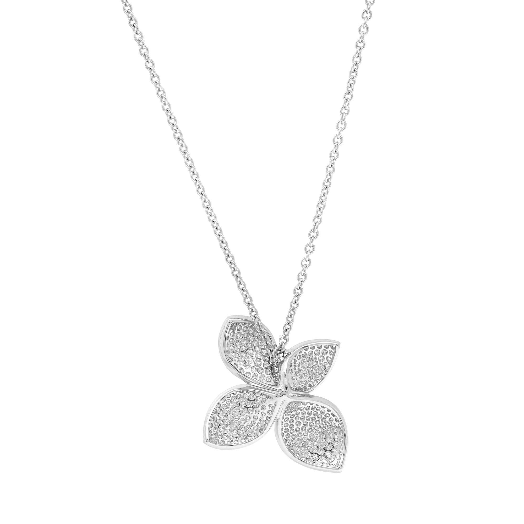 Fall in love with this beautiful flower pendant showcasing dazzling round cut diamonds. This pendant is a perfect gift for any occasion. It features a flower shaped pendant pave set with round brilliant cut diamonds weighing 1.01 carats. Necklace