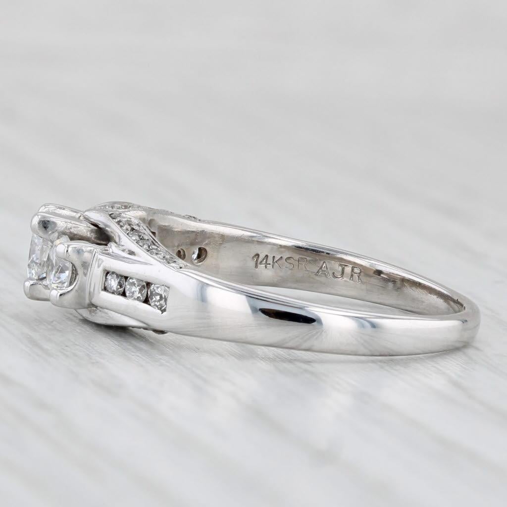 Gemstone Information:
- Natural Diamonds -
Total Carats - 0.43ct 
Cut - Round Brilliant
Color - F - G
Clarity - I1 

- Natural Diamonds -
Total Carats - 0.20ctw
Cut - Round Brilliant & Single
Color - F - H
Clarity - I1 - I2

- Natural Diamonds