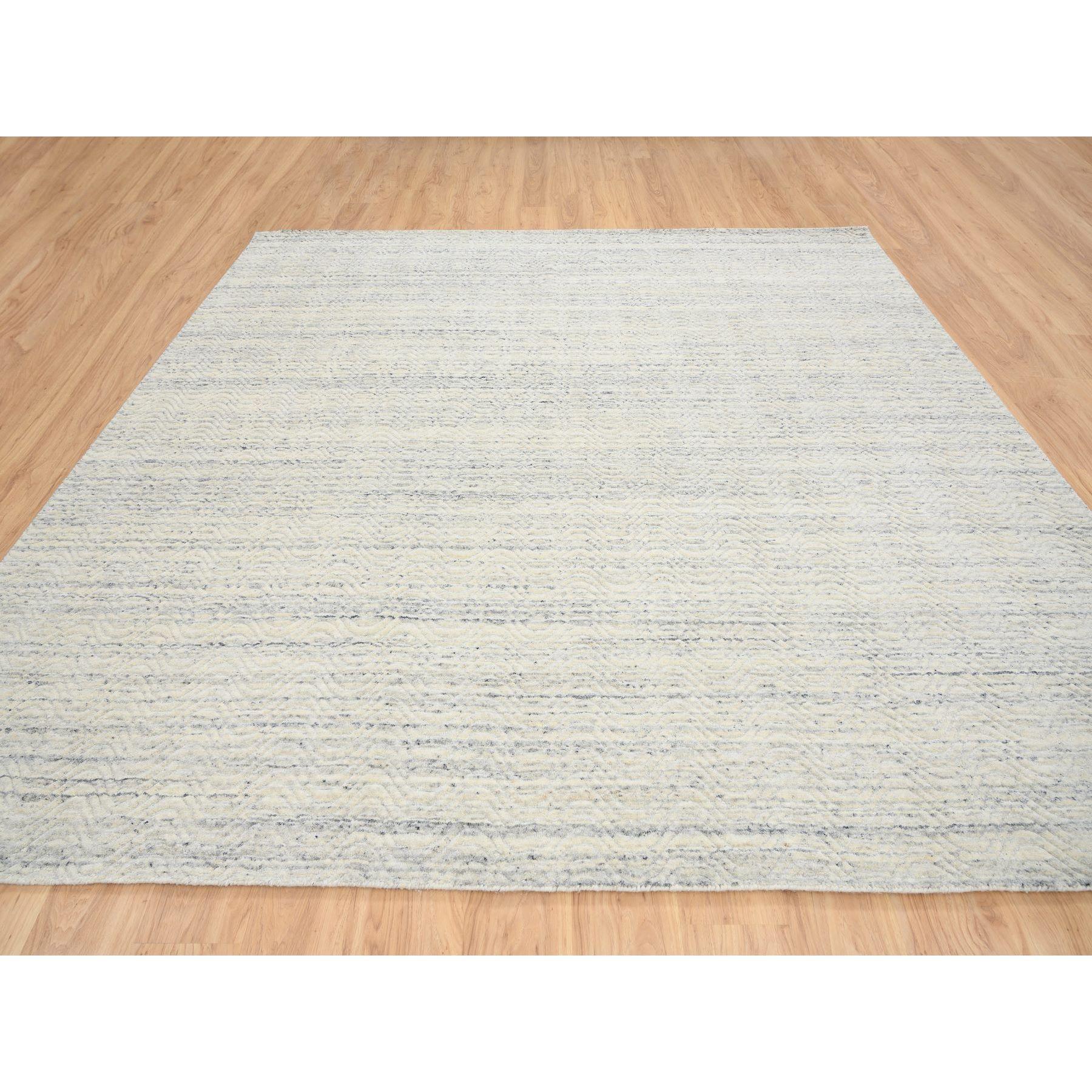 This is a truly genuine one-of-a-kind Beige, Hand Loomed Variegated Textured Modern Design, Natural Wool, Square Oriental Rug. It has been Loomed for months and months in the centuries-old weaving craftsmanship techniques by expert artisans.
Primary