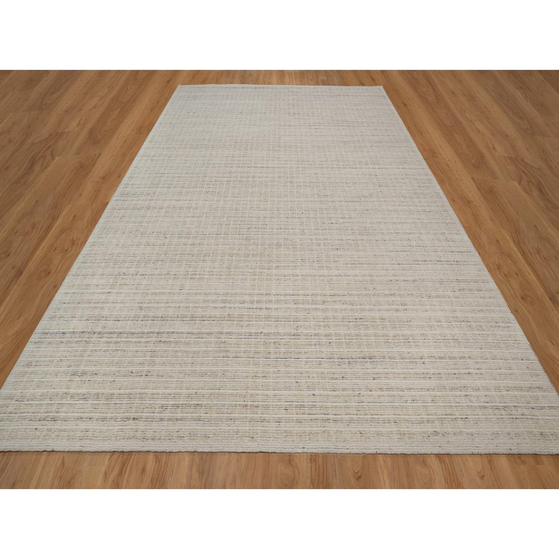 Bone White, Loomed Knotted, Modern Plain Decor Box Design, Pure Wool, Soft to the Touch, Oriental Rug
Primary materials: Wool
Latex: No Pile 
height: 0.25 Inches
Style: Contemporary
Primary color: Ivory
Secondary colors: Beige
Pattern: Oriental