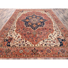 Tapis en laine noué à la main Serapi Heriz, rouge corail, 3,07 m x 4,32 m, avec motif en médaillon