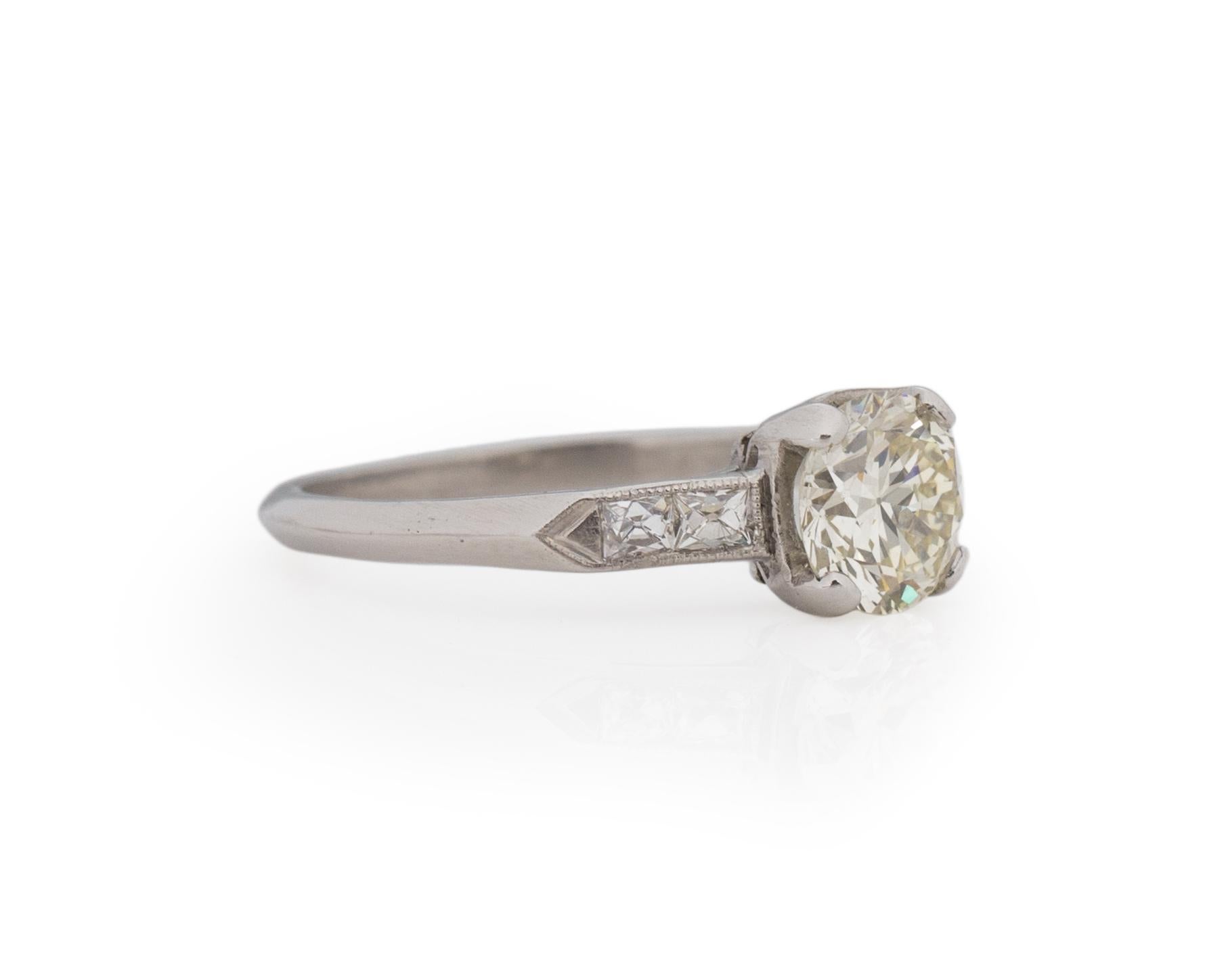 Ring Size: 6.75
Metal Type: Platinum [Hallmarked, and Tested]
Weight: 3.54 grams

Center Diamond Details:
Weight: 1.02ct
Cut: Old European brilliant
Color: O/P
Clarity: VS

Finger to Top of Stone Measurement: 5mm
Condition: Excellent