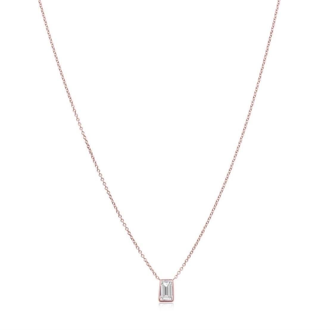 This stunning pendant necklace set in Italian hand made rose gold  setting featuring a charming tapered Asscher cut diamond, weighing 1.02 carats. E color VS1 clarity.
The incredible craftsmanship not often found on pendants this size has the