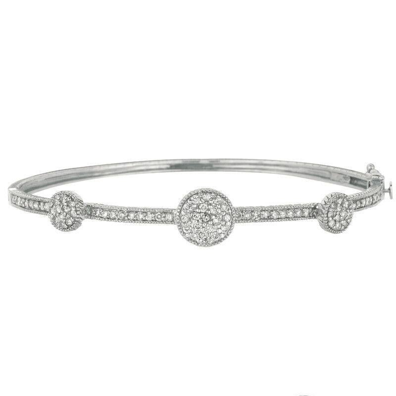 1.02 Carat Natural Diamond Bangle G SI 14K White Gold

100% Natural Diamonds, Not Enhanced in any way
1.02CT
G-H 
SI  
14K White Gold, Pave Style,   10.80gram
2 7/16