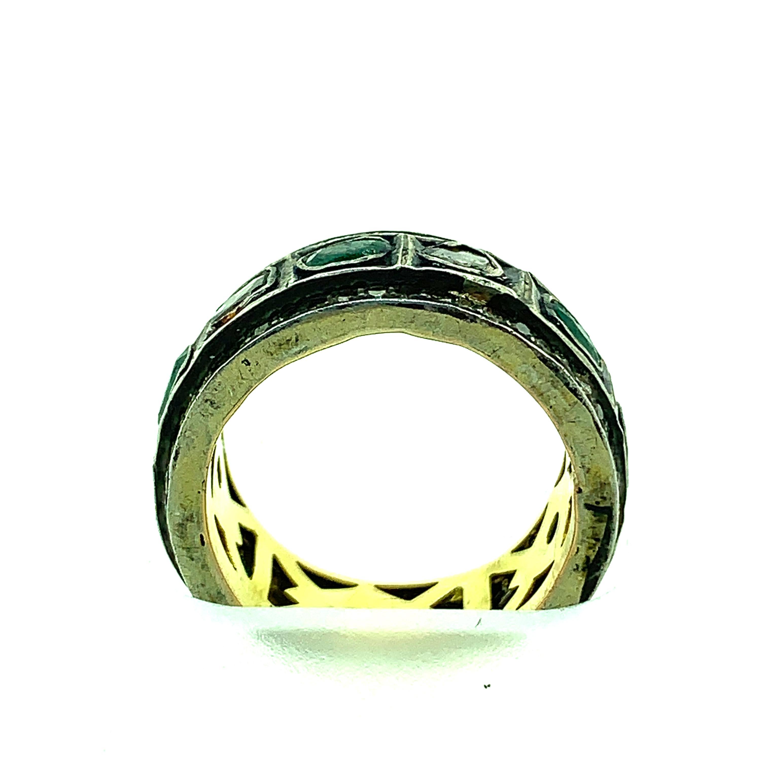 0.91 ct Old Mine Cut (Polki Diamond) and 1.02 ct Emerald Ring Band set in Oxidized Sterling Silver and 14K pure Gold. The ring band is neatly carved on the inside with 14KT Pure Gold and on the front it has a line of old mine cut diamonds surrounded