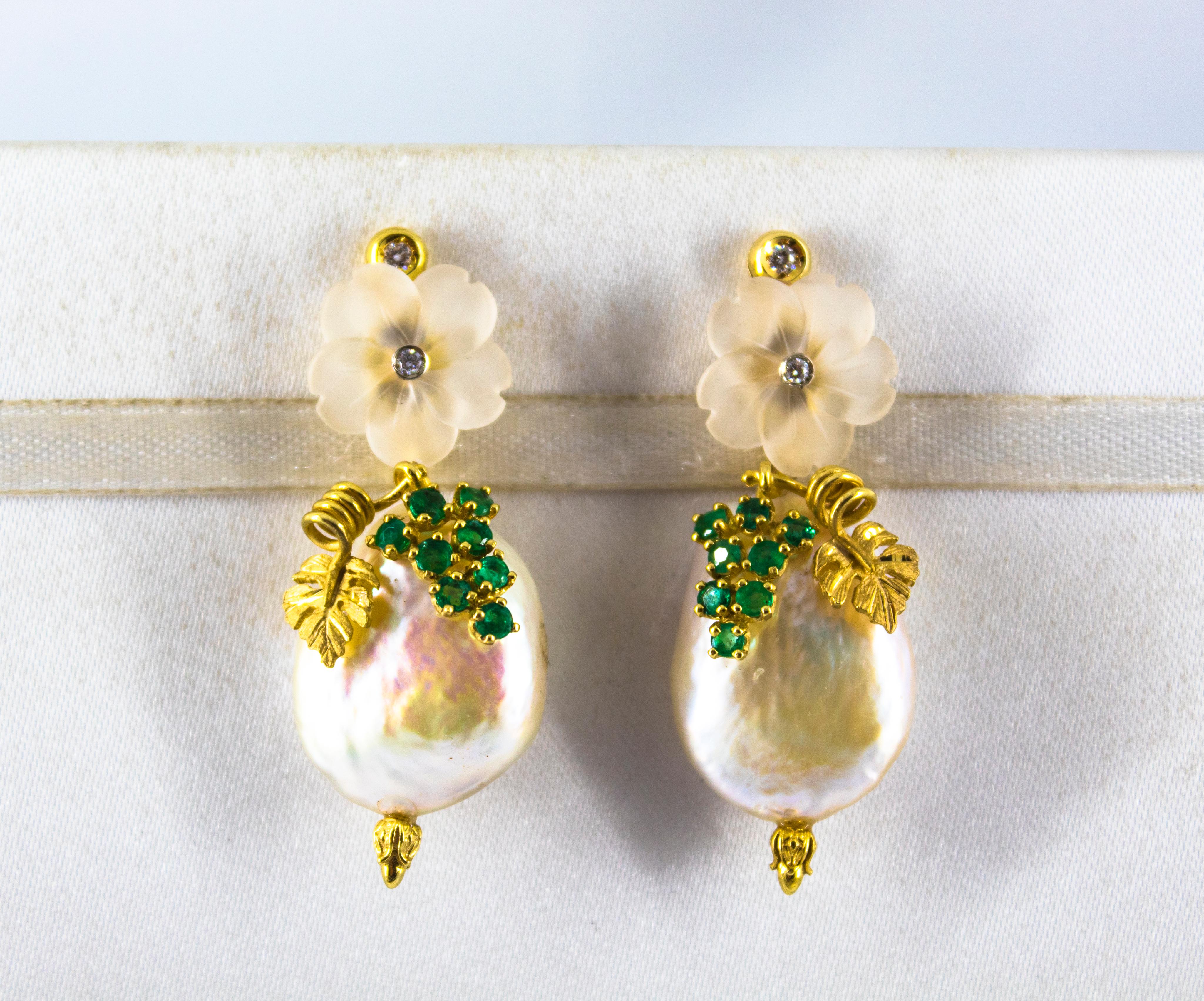 These Stud Earrings are made of 14K Yellow Gold.
These Earrings have 0.12 Carats of White Brilliant Cut Diamonds.
These Earrings have 0.90 Carats of Emeralds.
These Earrings have also Pearls and Rock Crystal.

These Earrings are available also with