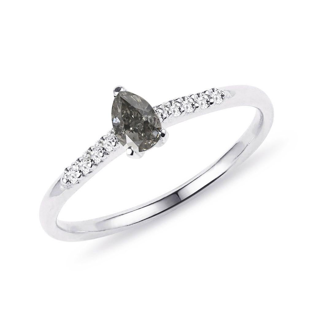 1.02 carat Fancy Gray Diamond Pear shape and white Diamond on White Gold 18K Ring.
Size upon request.