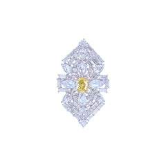 1.02 Carat Fancy Yellow Oval Diamond and White Diamond Ring
