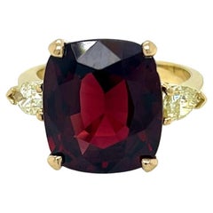 10.2 Carat Garnet and Yellow Diamond Three Stone Ring in 18K Yellow Gold