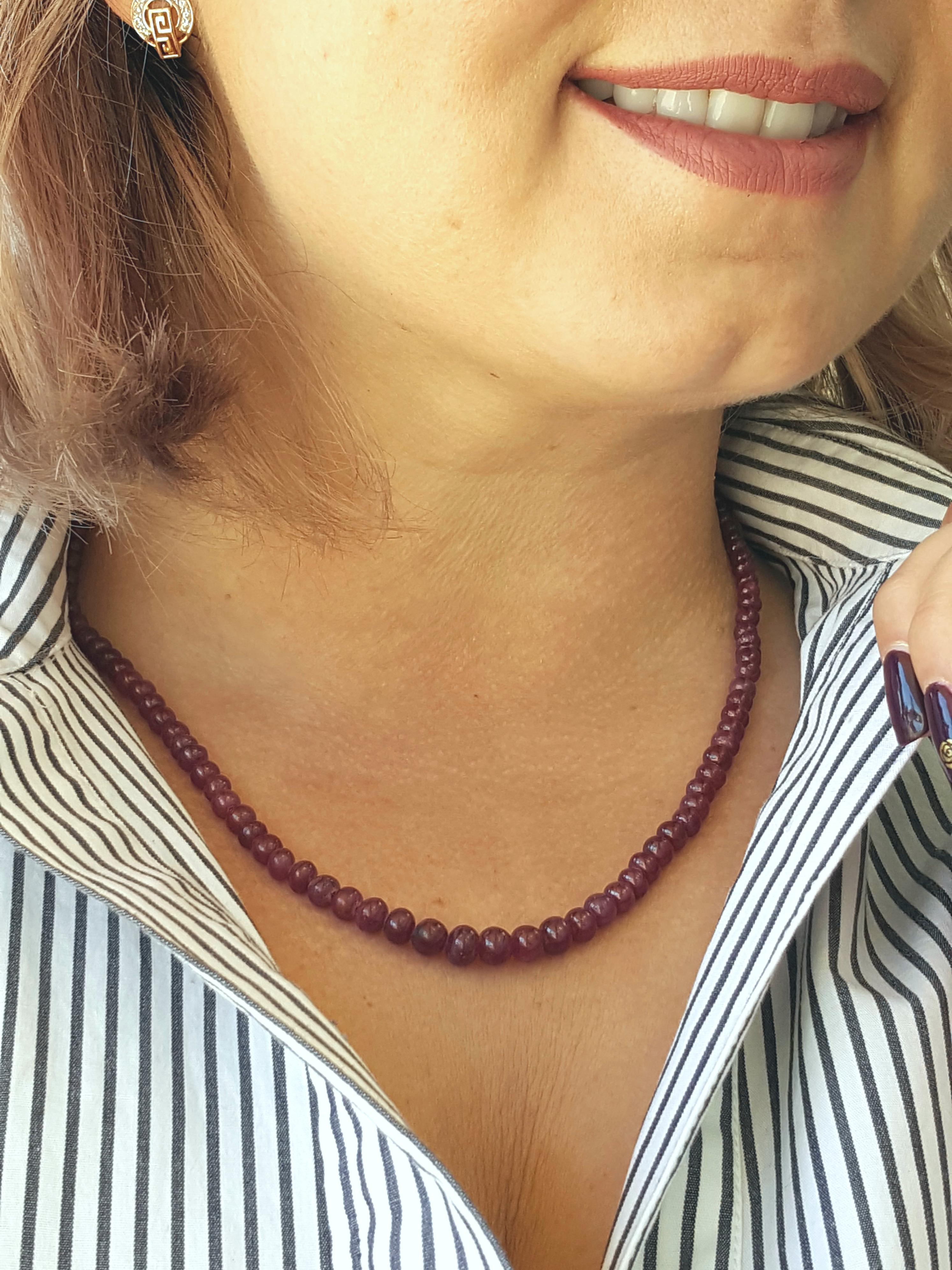 102 Genuine Rondelle Ruby Beaded Necklace is absolutely divine. The ruby beads range in size from 3.8 mm to 6.5 mm in diameter. Every bead in the necklace is genuine ruby. The colors are very bright and lively that  blend beautifully throughout the