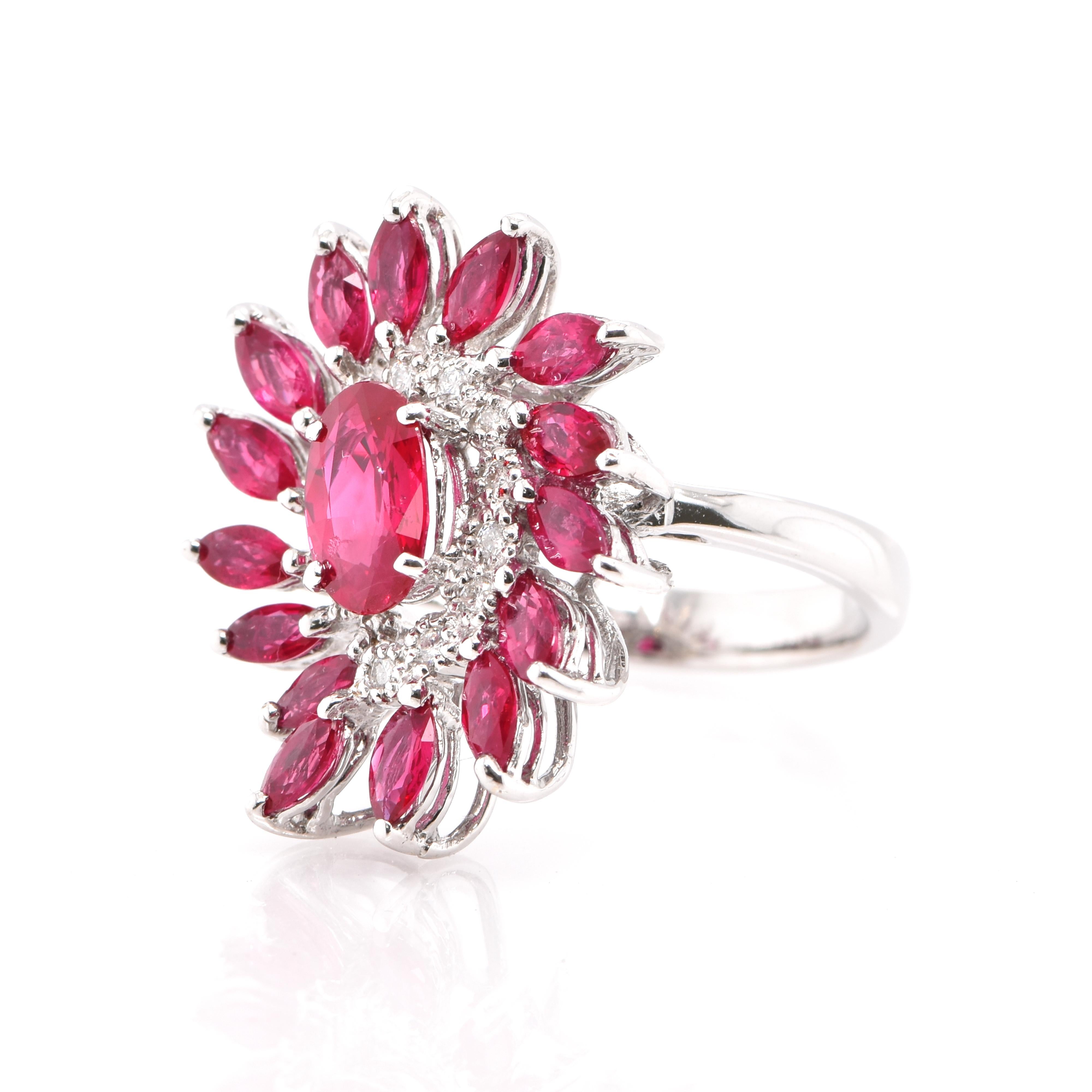 A beautiful Cocktail Ring featuring a GIA Certified 1.02 Carat, Natural, Burmese Oval-Shaped center Ruby, 2.02 Carats of Marquise-cut accent Rubies and 0.12 Carats of Round Brilliant Diamonds set in 18K White Gold. Rubies are referred to as