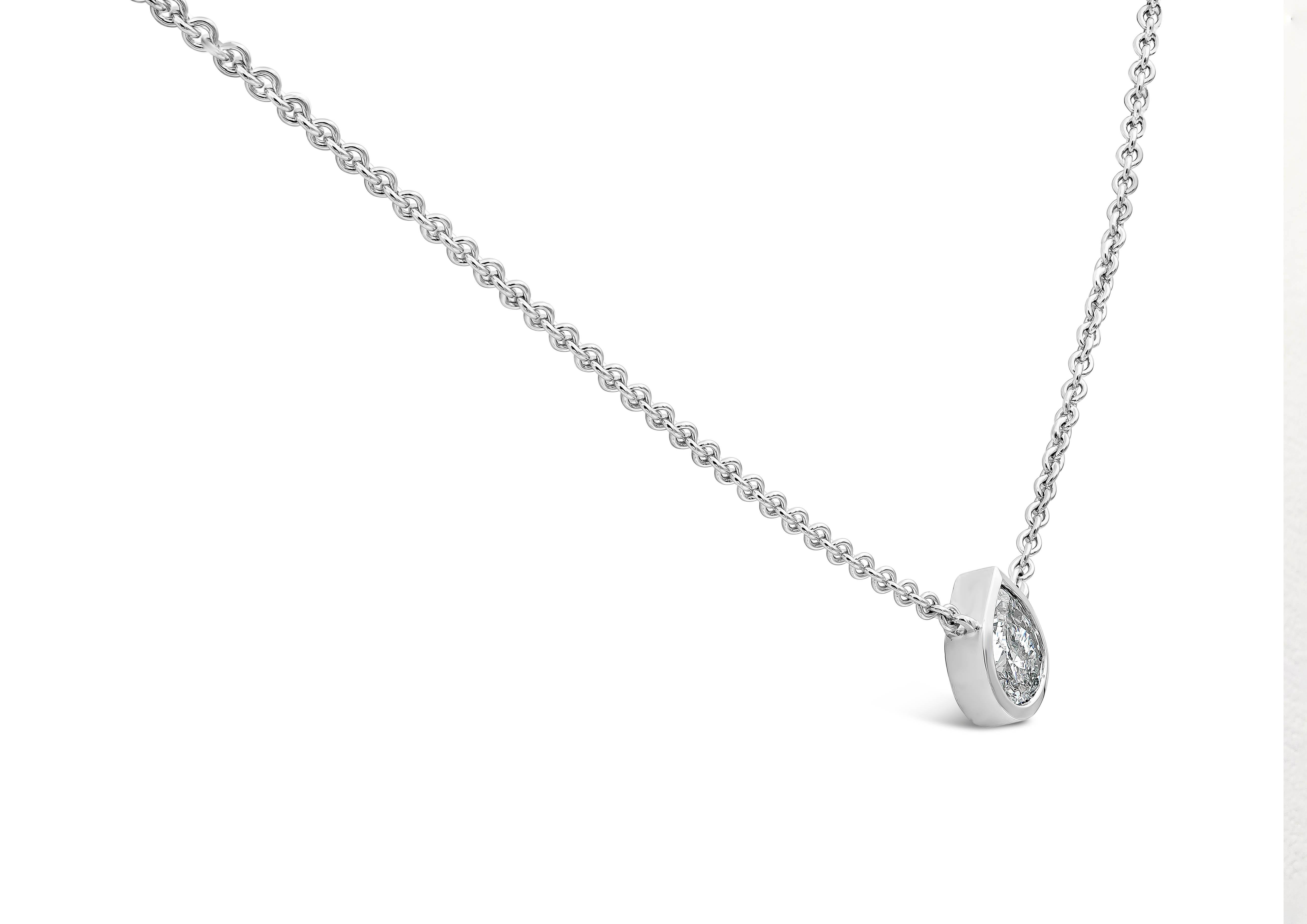 A simple and classic piece of pendant necklace showcasing a solitaire 1.02 carats pear shape diamond, E color and SI2 in clarity. Set in a polished bezel made in 14K White Gold. Suspended on an adjustable 18 inch white gold chain. 

Roman Malakov is