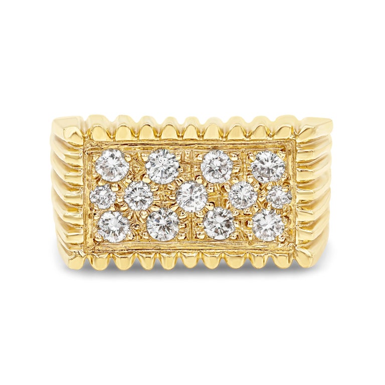 A chic men's fashion ring showcasing round brilliant diamonds, set in a flat 14 karat yellow gold mounting. Finished with bar edges to add to it's modern look. Diamonds weigh 1.02 carats total. Size 8.5 US.

Style available in different price