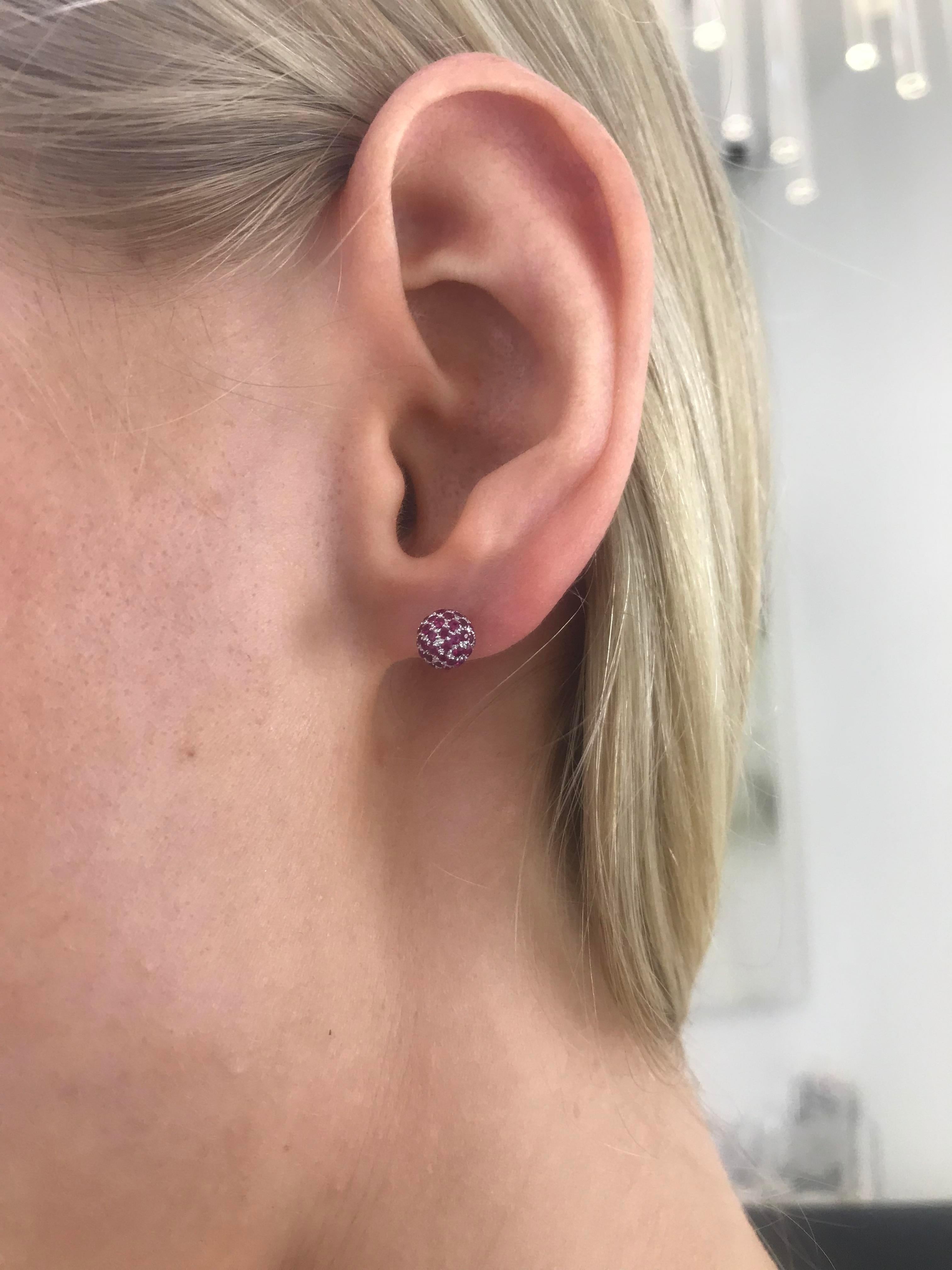 These Beautiful 1.02 Carat Round Deep colored Red Ruby Pave Set Diamond Stud Earrings set perfectly in 18 Karat White Gold. These stunning earrings are perfect for any occasion. British Hallmarked. 