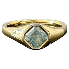 Used 1.02 carat unheated octagonal cut Montana sapphire and 18k yellow gold ring
