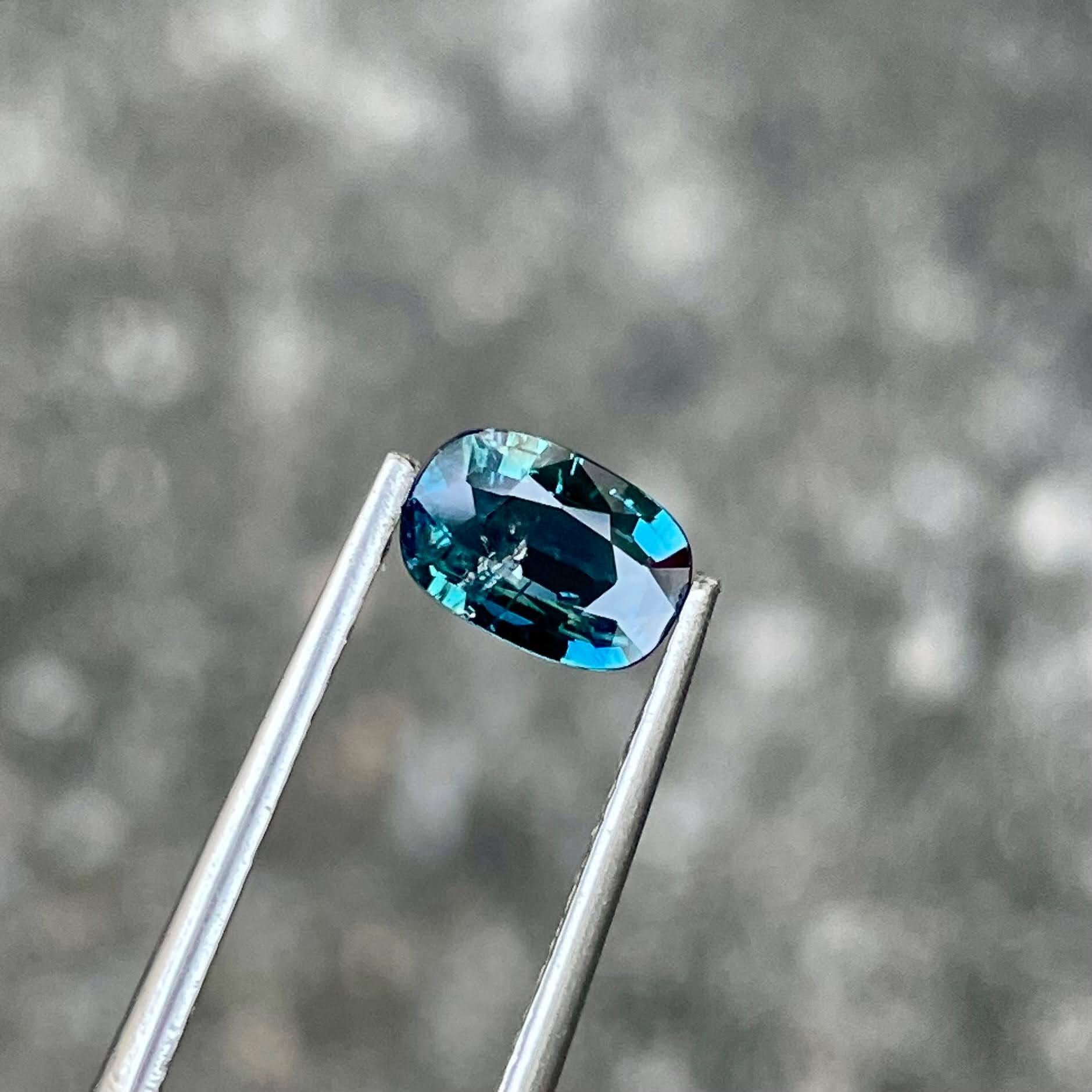 Weight 1.02 carats 
Dimensions 7.3x5.0x2.6 mm
Treatment heated 
Origin Madagascar 
Clarity SI
Shape cushion 
Cut Faceted 



This stunning 1.02 carat teal blue sapphire from Madagascar showcases a unique and captivating hue, blending deep oceanic